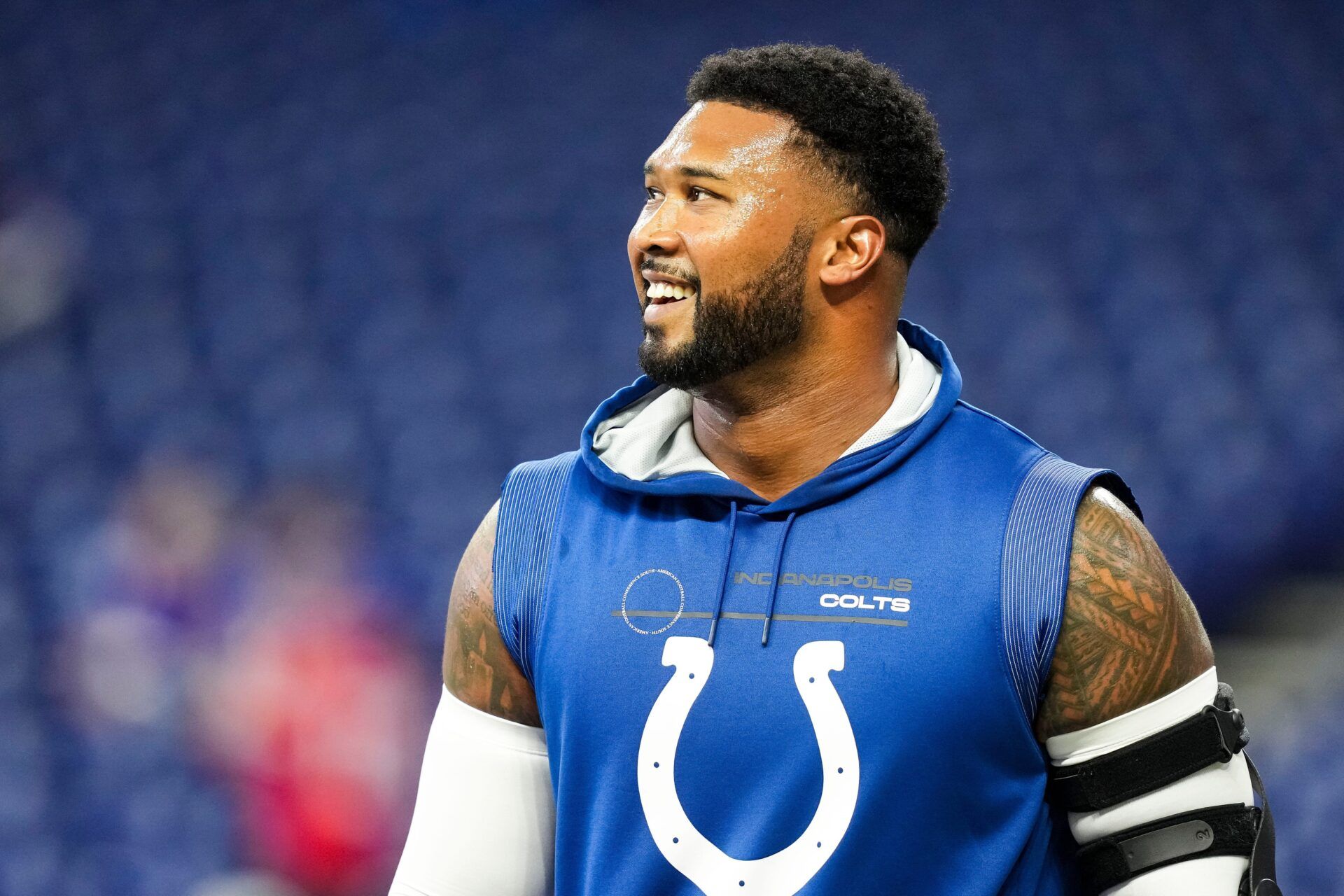 Indianapolis Colts defensive tackle DeForest Buckner (99) smiles Sunday, Nov. 10, 2024, during a game against the Buffalo Bills at Lucas Oil Stadium in Indianapolis.