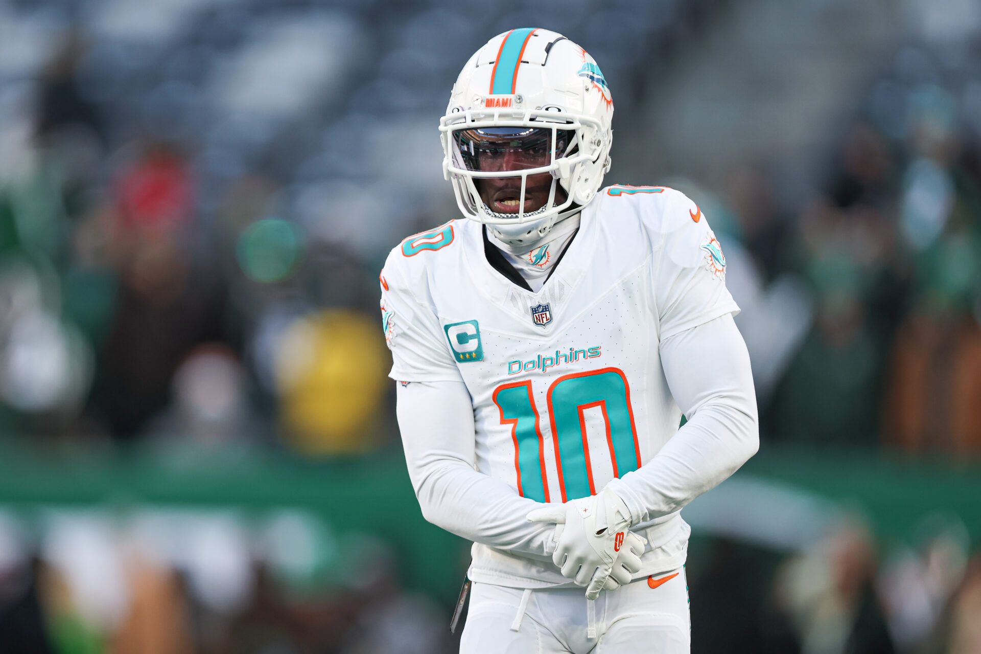 Jan 5, 2025; East Rutherford, New Jersey, USA; Miami Dolphins wide receiver Tyreek Hill (10) on the field before the game against the New York Jets at MetLife Stadium. Mandatory Credit: Vincent Carchietta-Imagn Images