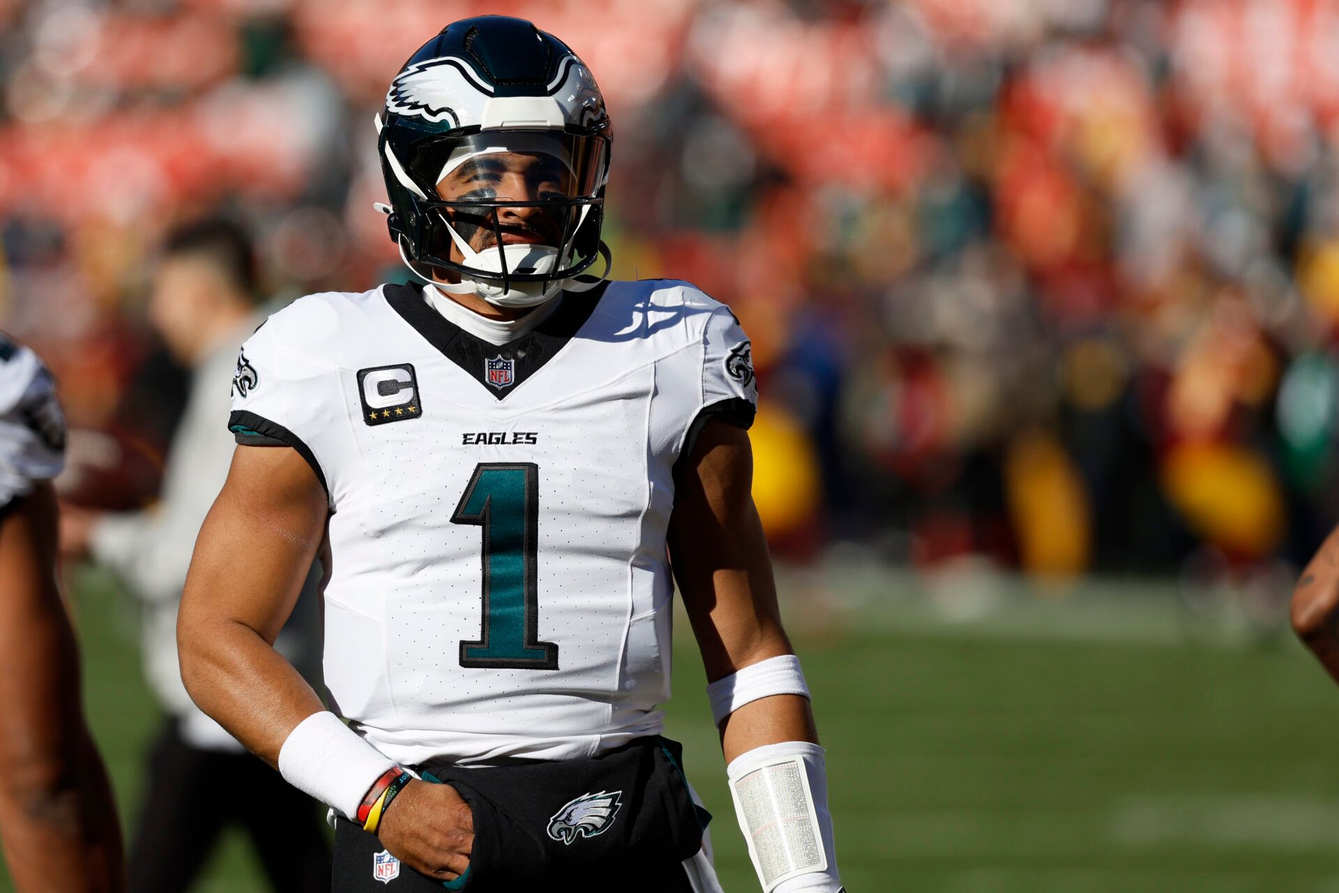 Dec 22, 2024; Landover, Maryland, USA; Philadelphia Eagles quarterback Jalen Hurts (1) stands on the field during warmup prior to the game against the Washington Commanders at Northwest Stadium. Mandatory Credit: Geoff Burke-Imagn Images