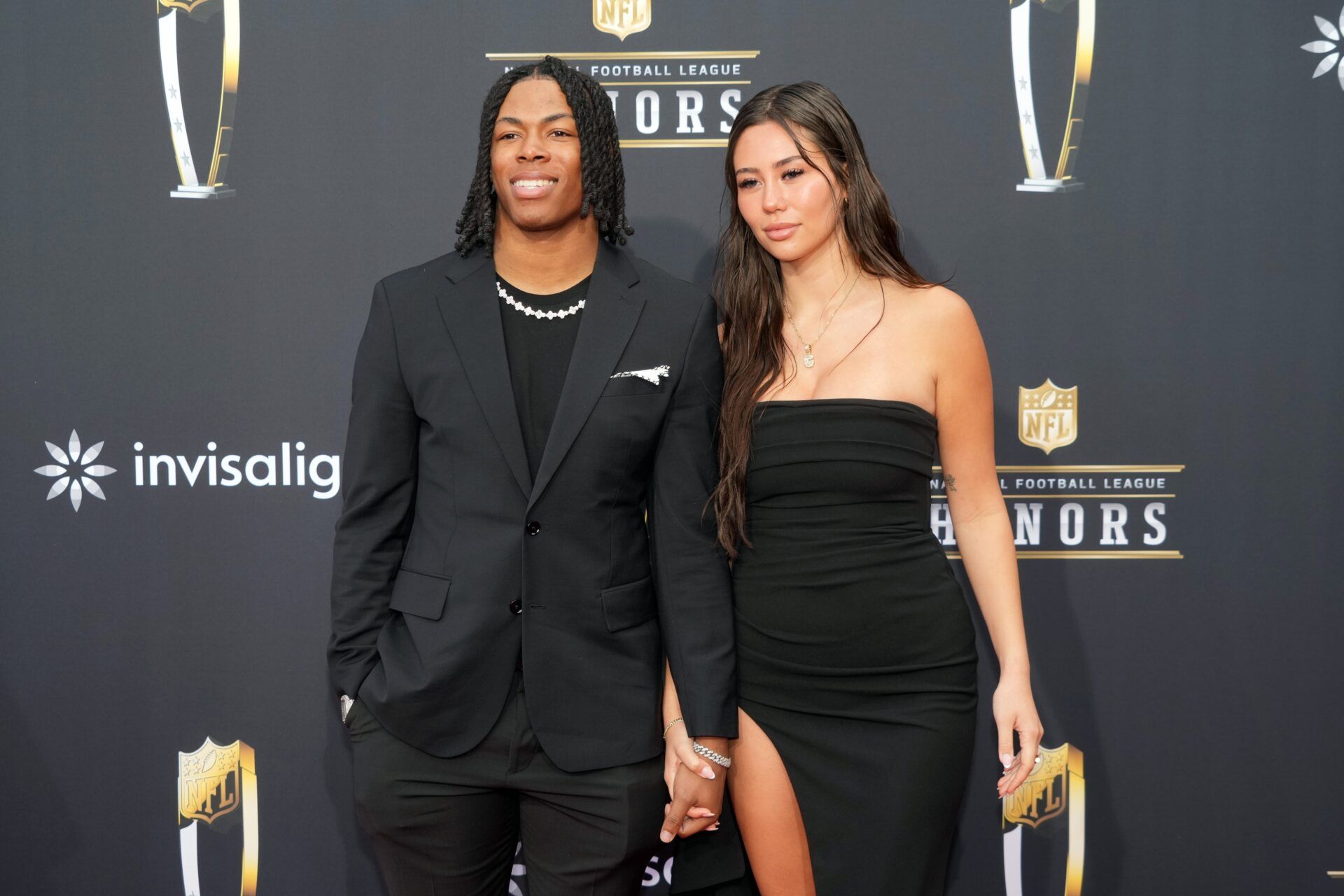 Jahmyr Gibbs and Nicole Anderson on the red carpet before the NFL Honors show at Resorts World Theatre.