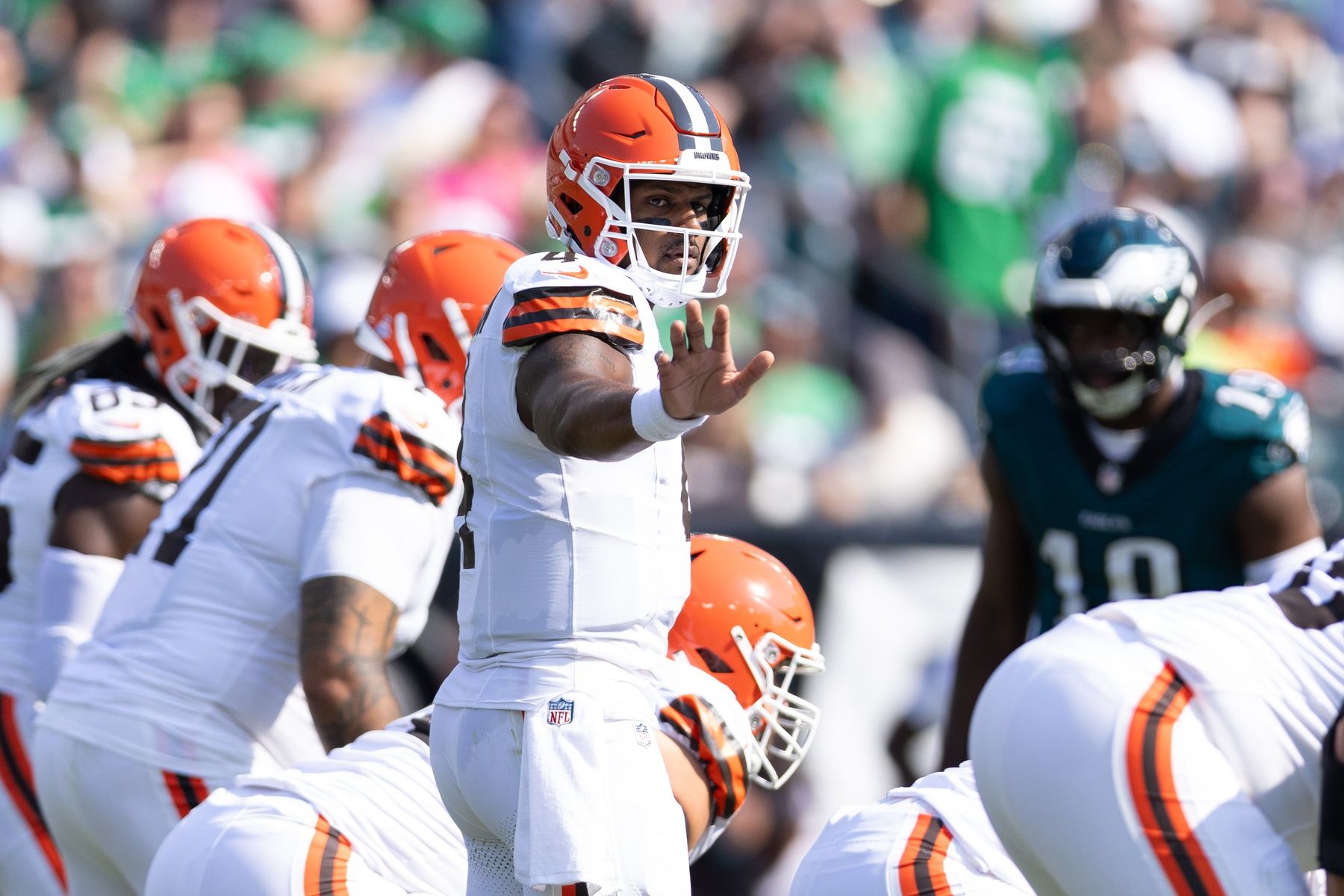 Cleveland Browns quarterback Deshaun Watson (4) directs the offense at the line of scrimmage against the Philadelphia Eagles during the first quarter at Lincoln Financial Field.