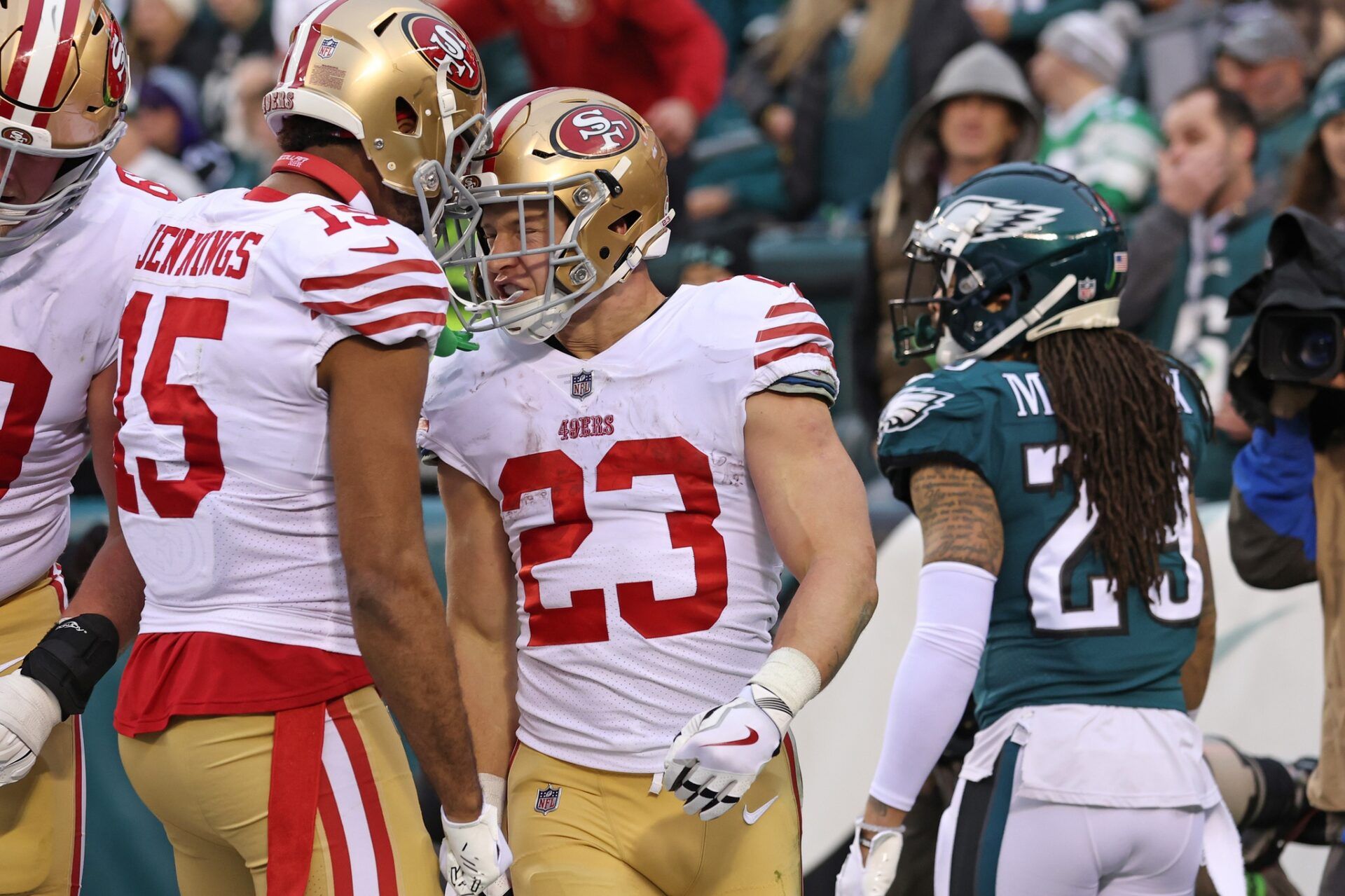 San Francisco 49ers running back Christian McCaffrey (23) celebrates his 23-yard touchdown run with wide receiver Jauan Jennings (15) against the Philadelphia Eagles during the second quarter in the NFC Championship game at Lincoln Financial Field.