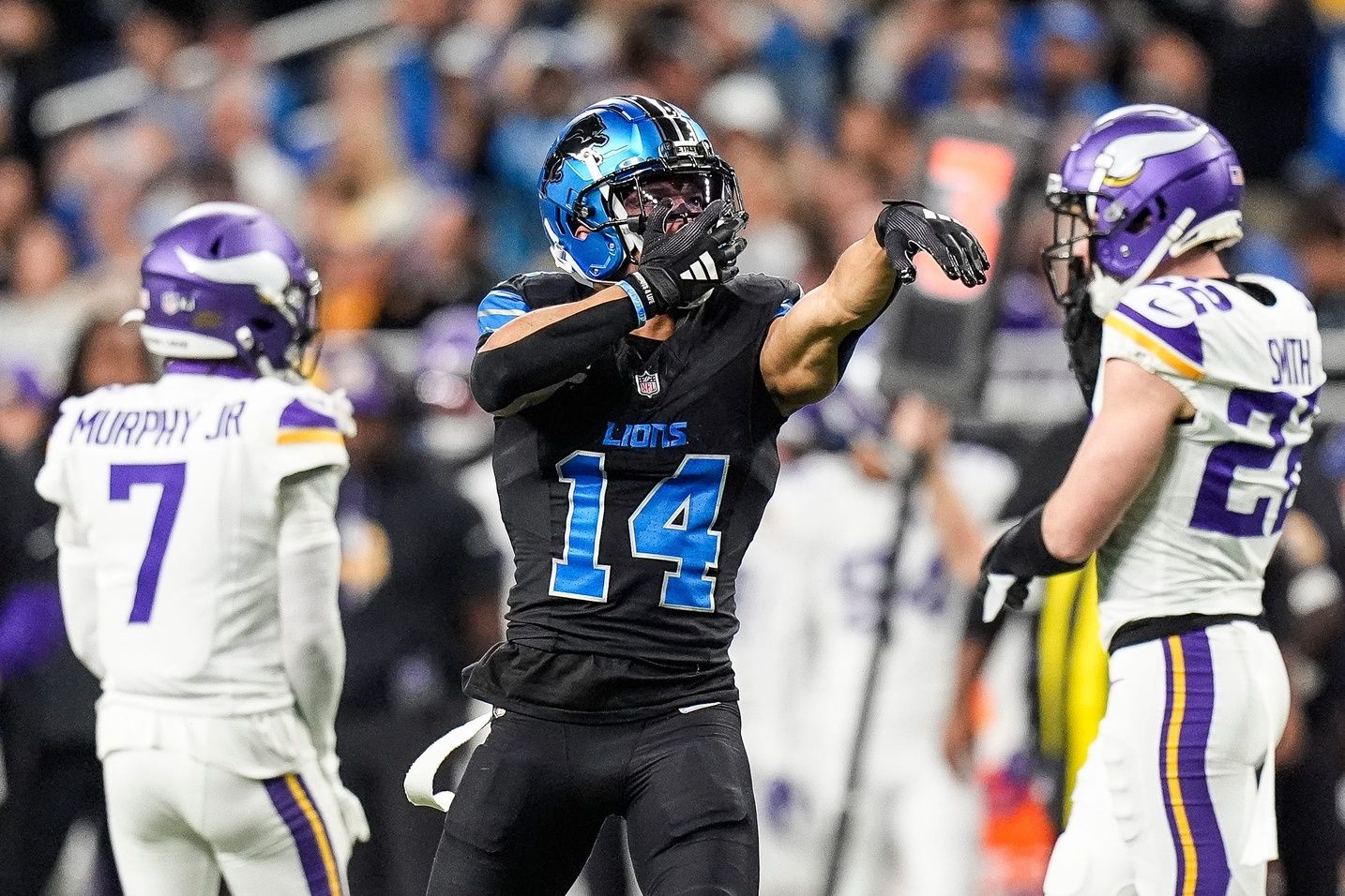 Detroit Lions wide receiver Amon-Ra St. Brown (14) celebrates a first down against Minnesota Vikings during the second half at Ford Field in Detroit on Sunday, Jan. 5, 2025.