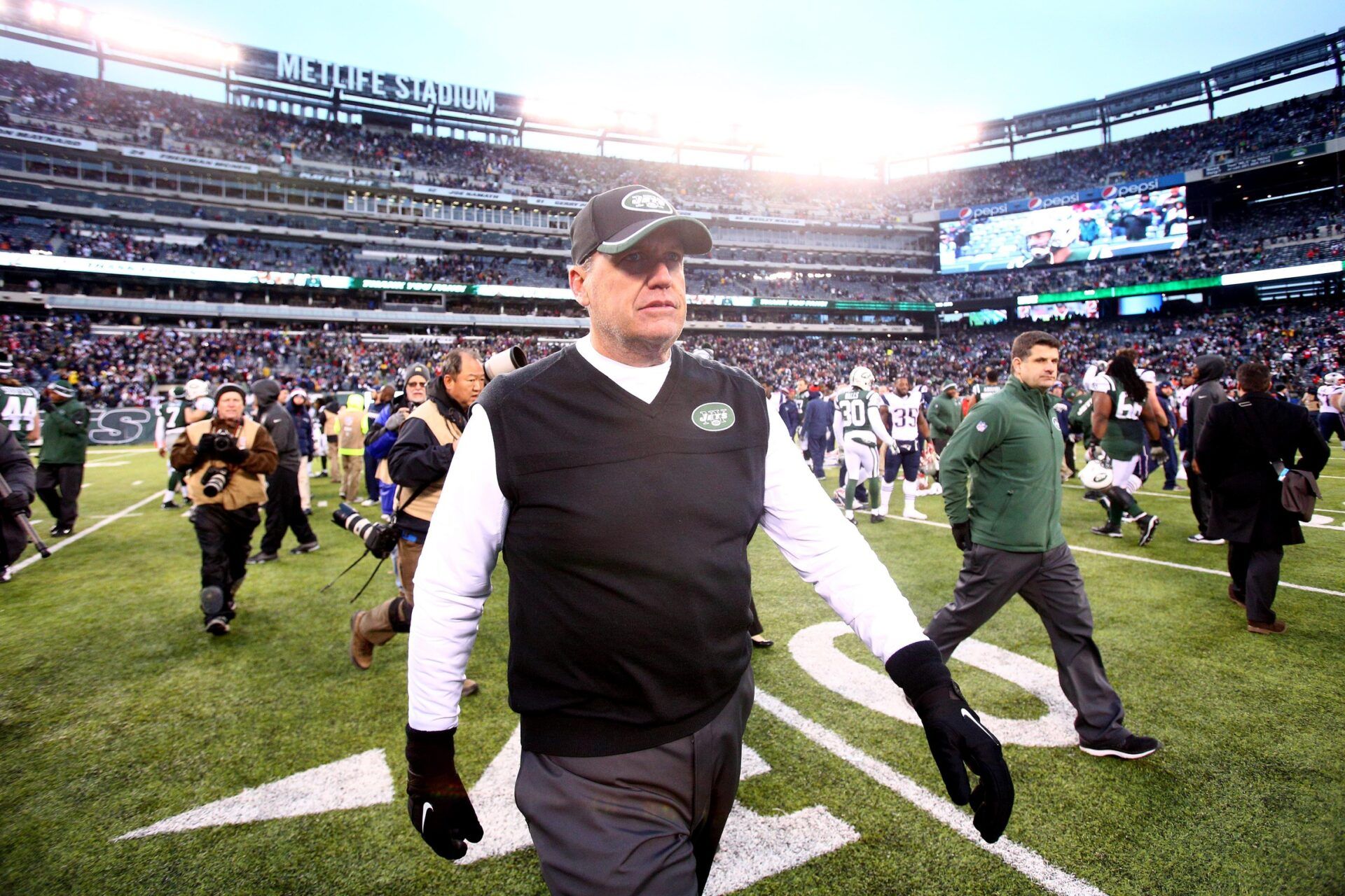 New York Jets head coach Rex Ryan walks off the field after losing to the New England Patriots at MetLife Stadium. The Patriots defeated the Jets 17-16.