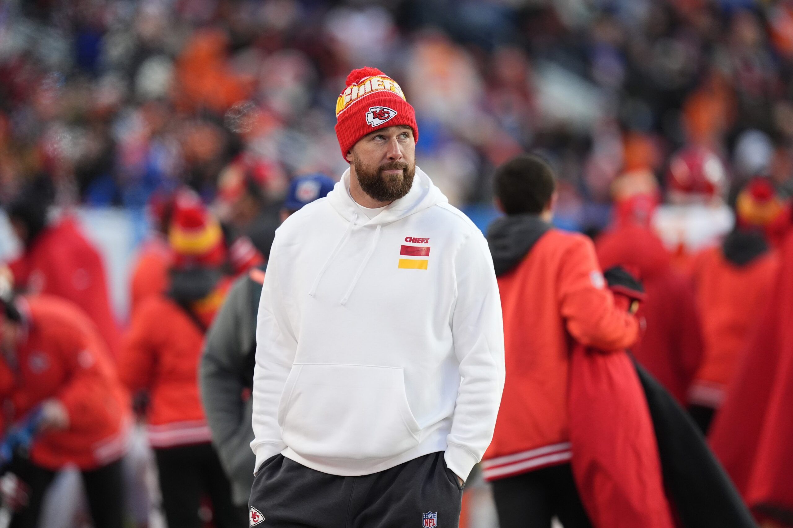 Kansas City Chiefs tight end Travis Kelce (87) walks the sidelines in the second half against the Denver Broncos at Empower Field at Mile High.