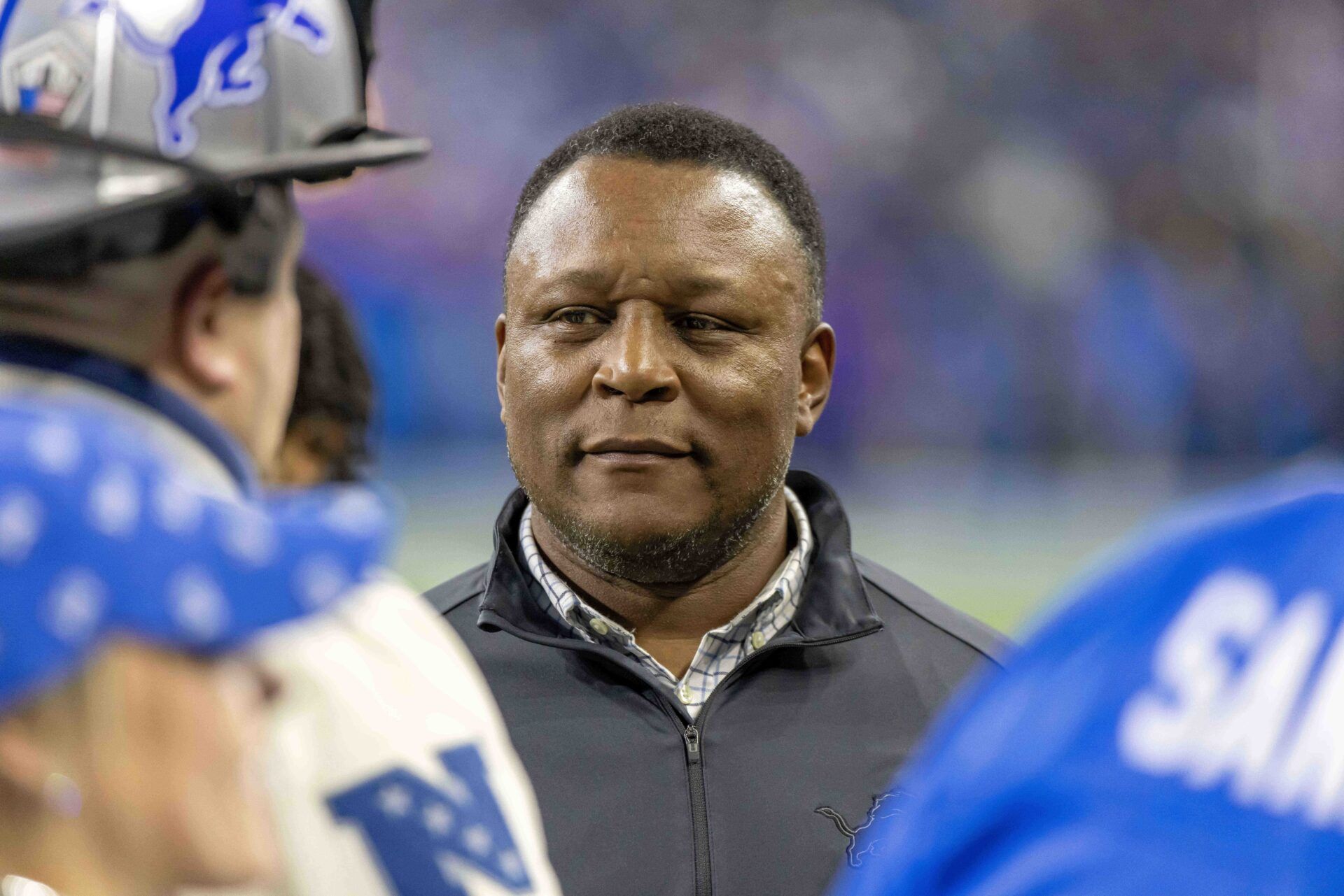 Former Detroit Lions player Barry Sanders on the sidelines in warm ups before the game against the Minnesota Vikings at Ford Field.