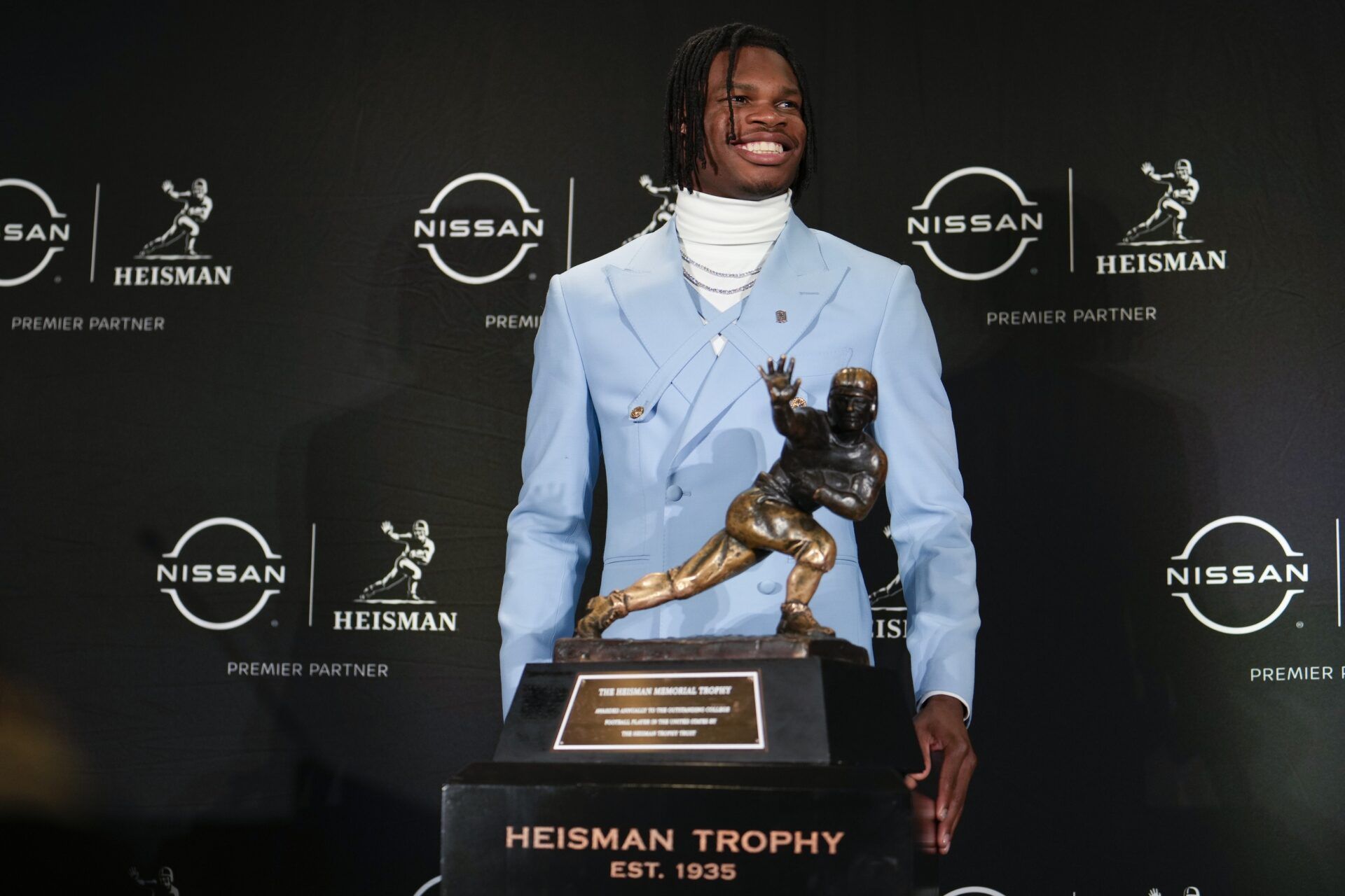 Colorado Buffaloes wide receiver/cornerback Travis Hunter poses for a photo during a press conference before the 2024 Heisman Trophy Presentation.