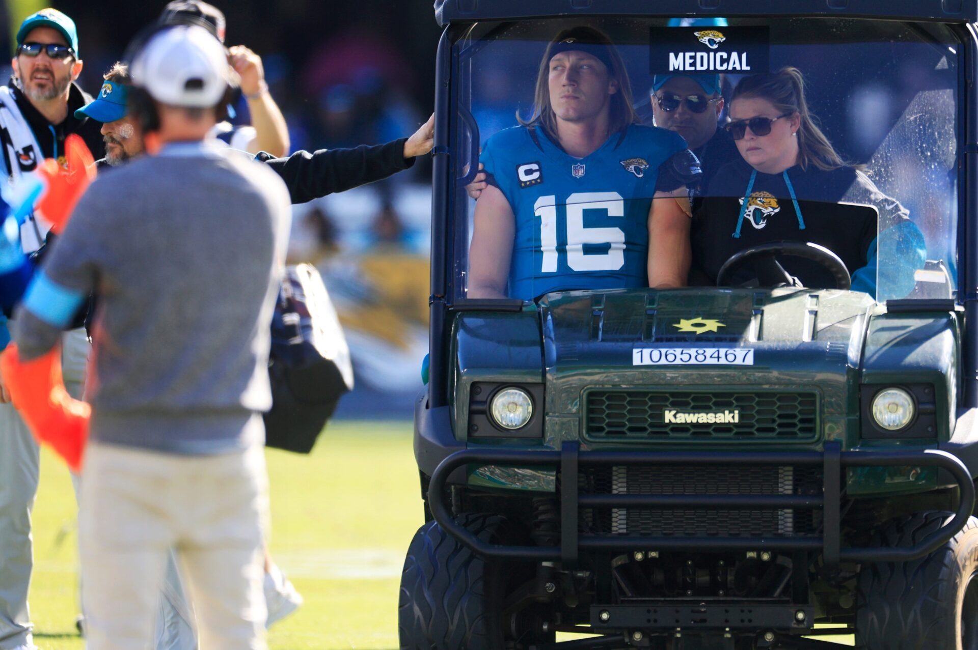 Jacksonville Jaguars quarterback Trevor Lawrence (16) is carted off the field after sustaining a heavy hit during the second quarter of an NFL football matchup Sunday, Dec. 1, 2024 at EverBank Stadium in Jacksonville, Fla.