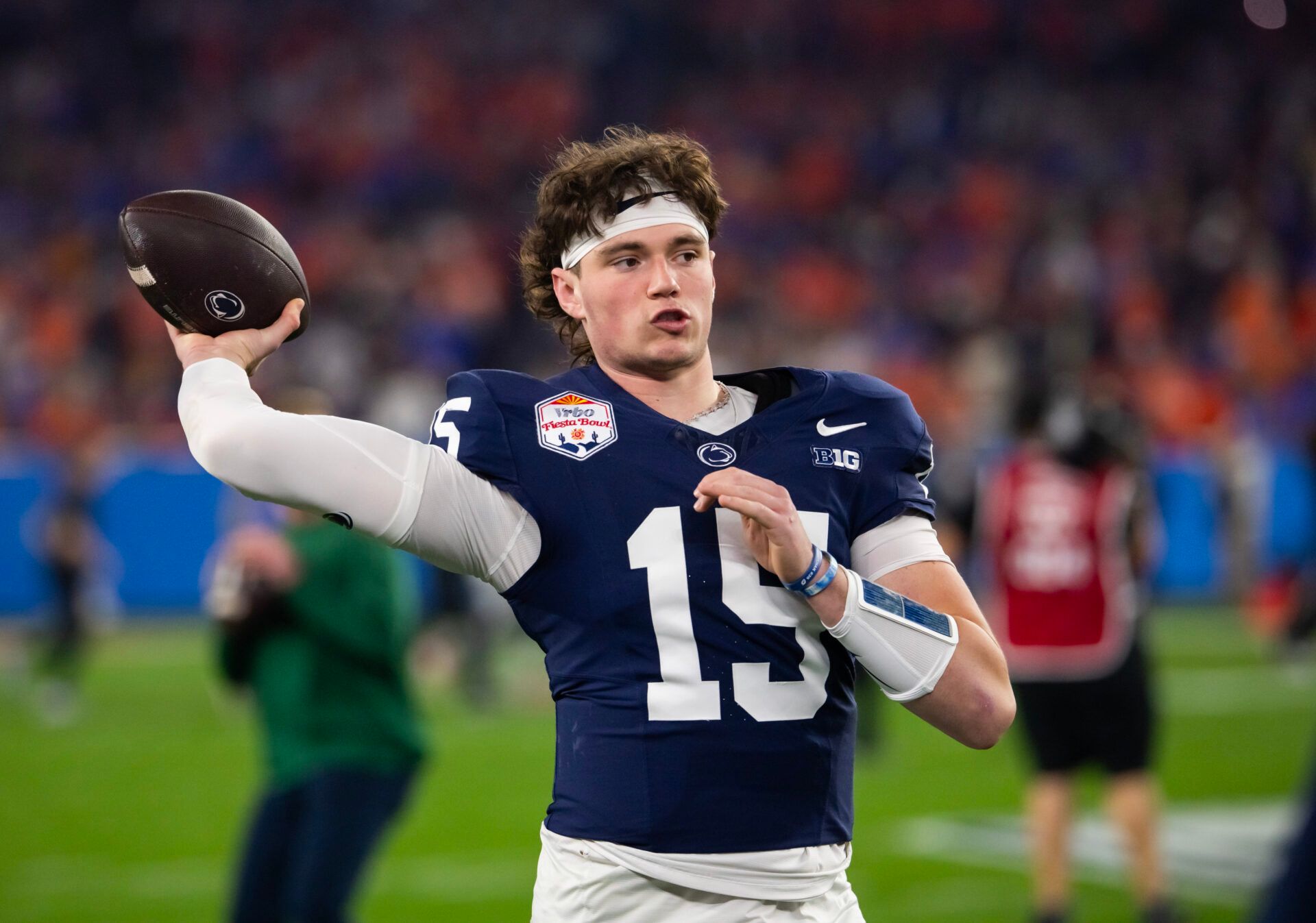 Dec 31, 2024; Glendale, AZ, USA; Penn State Nittany Lions quarterback Drew Allar (15) against the Boise State Broncos in the Fiesta Bowl at State Farm Stadium. Mandatory Credit: Mark J. Rebilas-Imagn Images