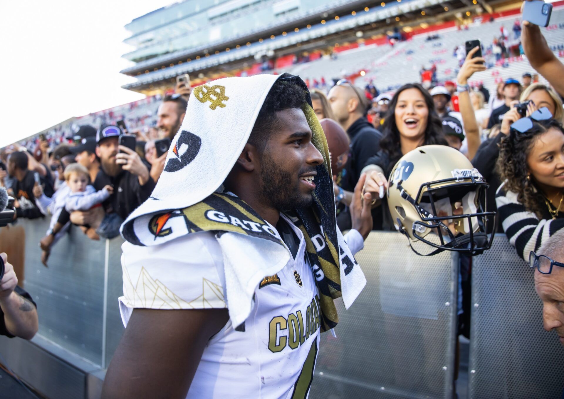 Colorado Buffalos quarterback Shedeur Sanders (2) greets fans after defeating the Arizona Wildcats at Arizona Stadium.