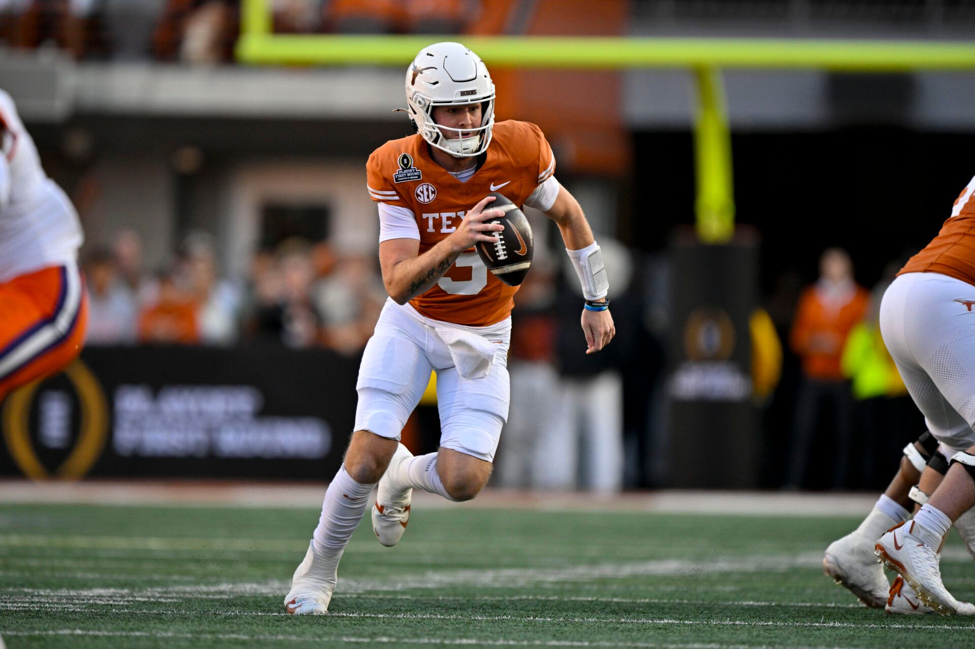 Dec 21, 2024; Austin, Texas, USA; Texas Longhorns quarterback Quinn Ewers (3) in action during the game between the Texas Longhorns and the Clemson Tigers in the CFP National Playoff First Round at Darrell K Royal-Texas Memorial Stadium. Mandatory Credit: Jerome Miron-Imagn Images