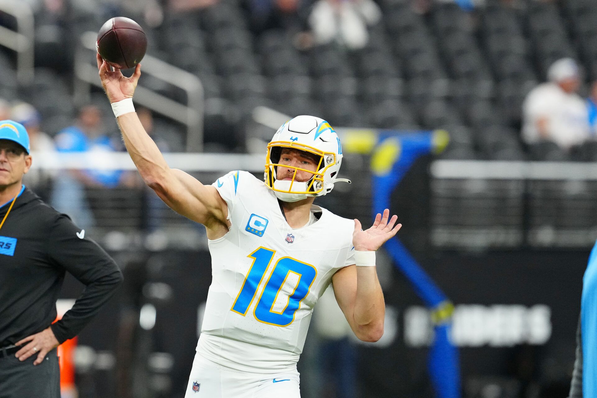 Jan 5, 2025; Paradise, Nevada, USA; Los Angeles Chargers quarterback Justin Herbert (10) warms up before a game against the Las Vegas Raiders at Allegiant Stadium. Mandatory Credit: Stephen R. Sylvanie-Imagn Images