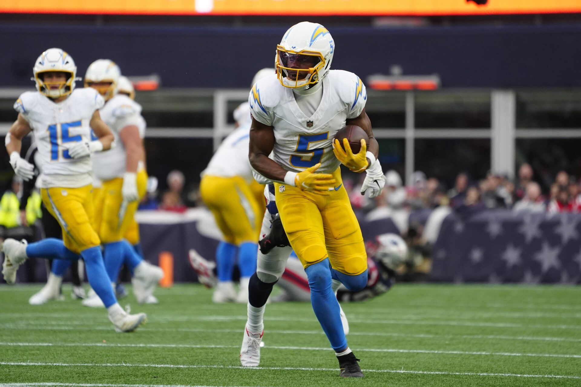 Los Angeles Chargers wide receiver Joshua Palmer (5) runs with the ball against the New England Patriots during the second half at Gillette Stadium.