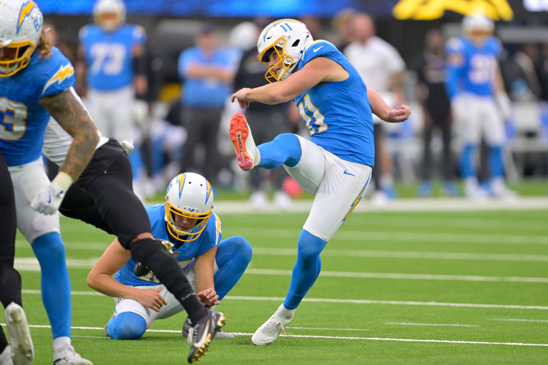 Oct 27, 2024; Inglewood, California, USA; Los Angeles Chargers place kicker Cameron Dicker (11) hits a field goal in the second half against the New Orleans Saints at SoFi Stadium. Mandatory Credit: Jayne Kamin-Oncea-Imagn Images