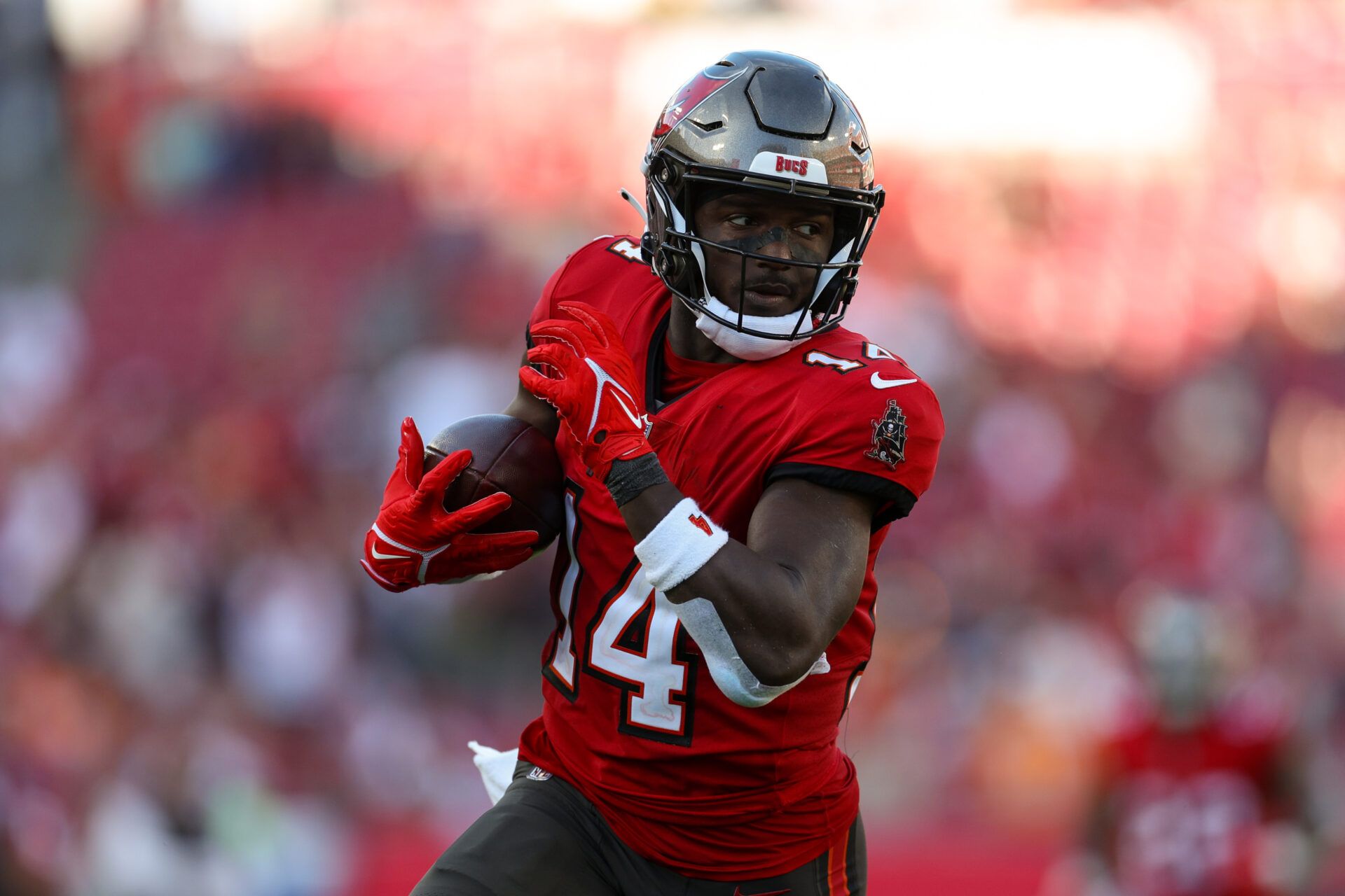 Dec 31, 2023; Tampa, Florida, USA; Tampa Bay Buccaneers wide receiver Chris Godwin (14) catches a pass for a touchdown against the New Orleans Saints in the fourth quarter at Raymond James Stadium. Mandatory Credit: Nathan Ray Seebeck-USA TODAY Sports