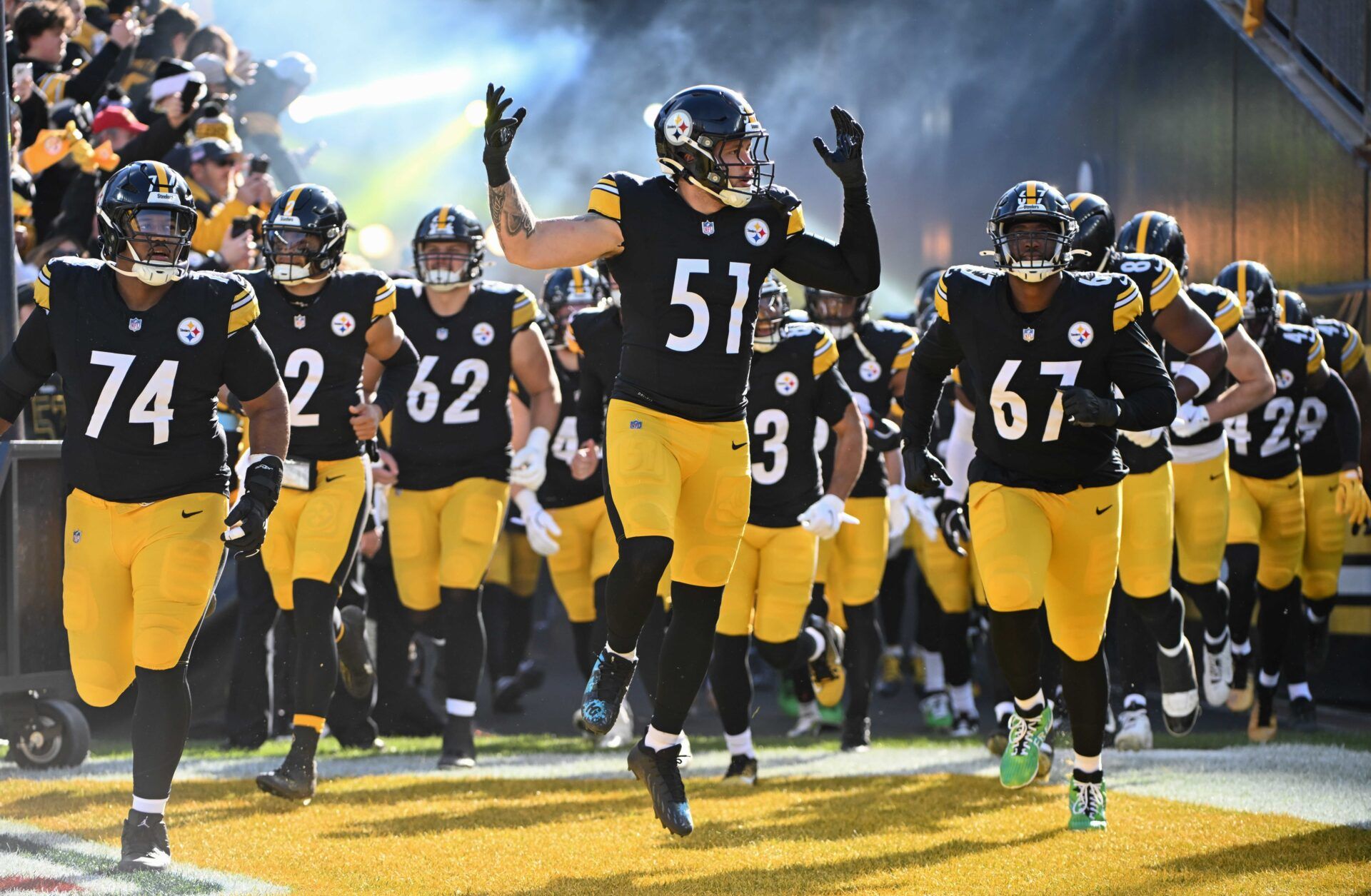 Pittsburgh Steelers linebacker Nick Herbig (51) leads the team onto field for a game against the Cleveland Browns at Acrisure Stadium.