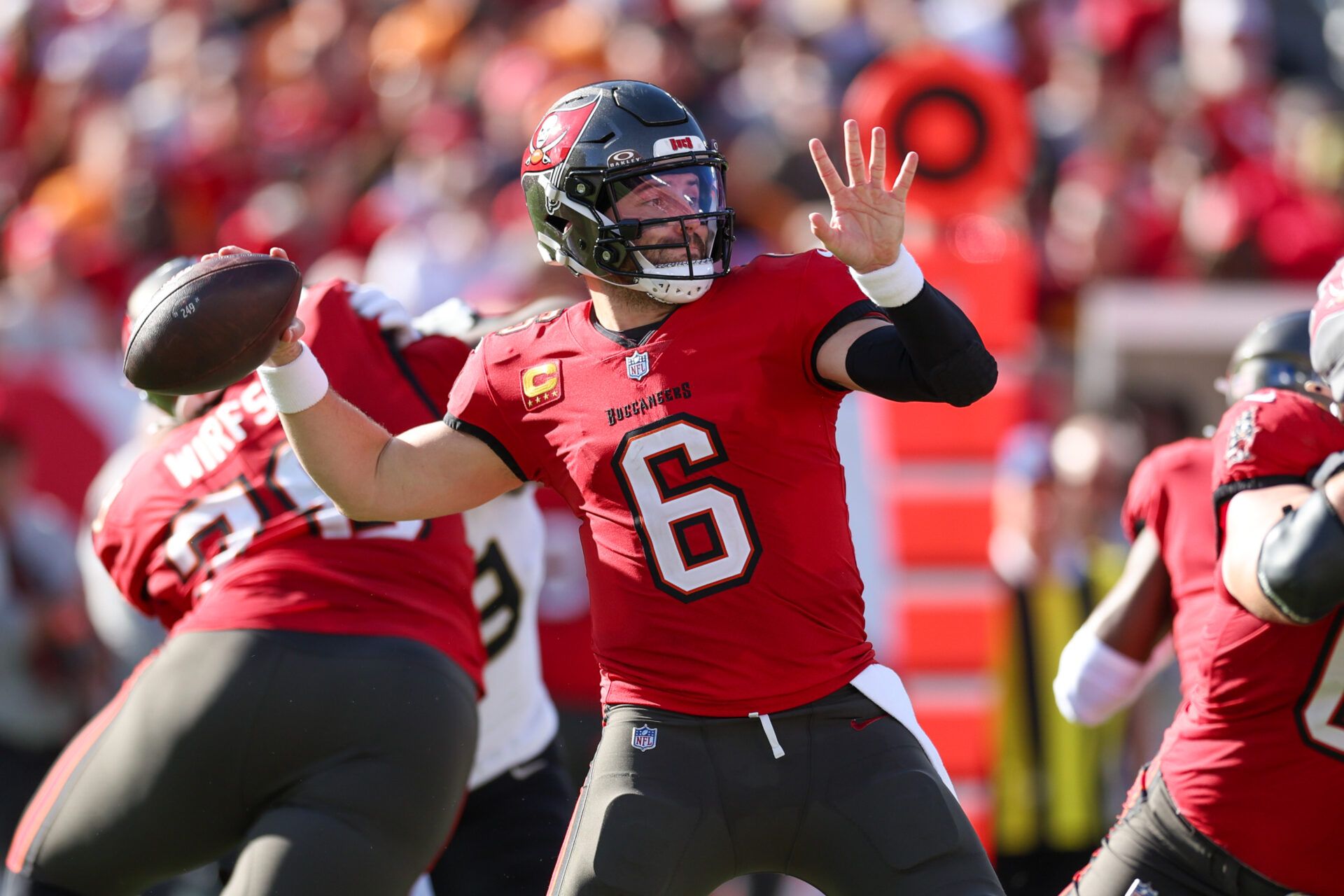 Jan 5, 2025; Tampa, Florida, USA; Tampa Bay Buccaneers quarterback Baker Mayfield (6) drops back to pass against the New Orleans Saints in the third quarter at Raymond James Stadium. Mandatory Credit: Nathan Ray Seebeck-Imagn Images