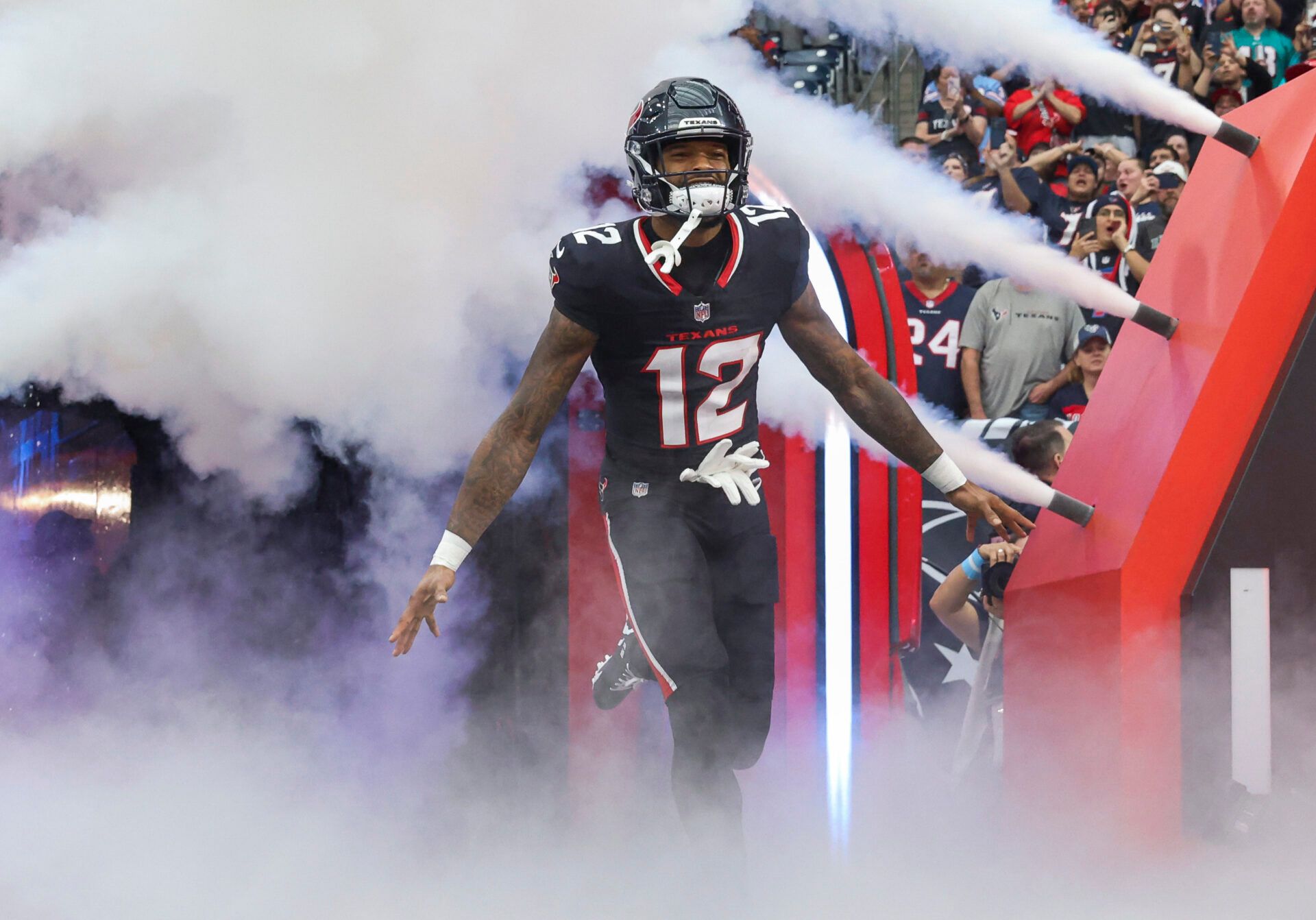 Dec 15, 2024; Houston Texans wide receiver Nico Collins (12) runs onto the field before the game against the Miami Dolphins at NRG Stadium. Mandatory Credit: Troy Taormina-Imagn Images