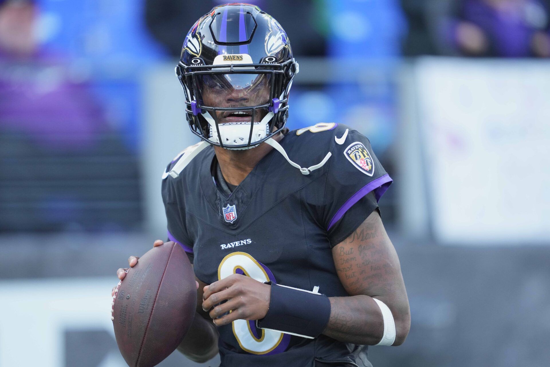 Baltimore Ravens quarterback Lamar Jackson (8) warms up prior the game against the Philadelphia Eagles at M&T Bank Stadium.