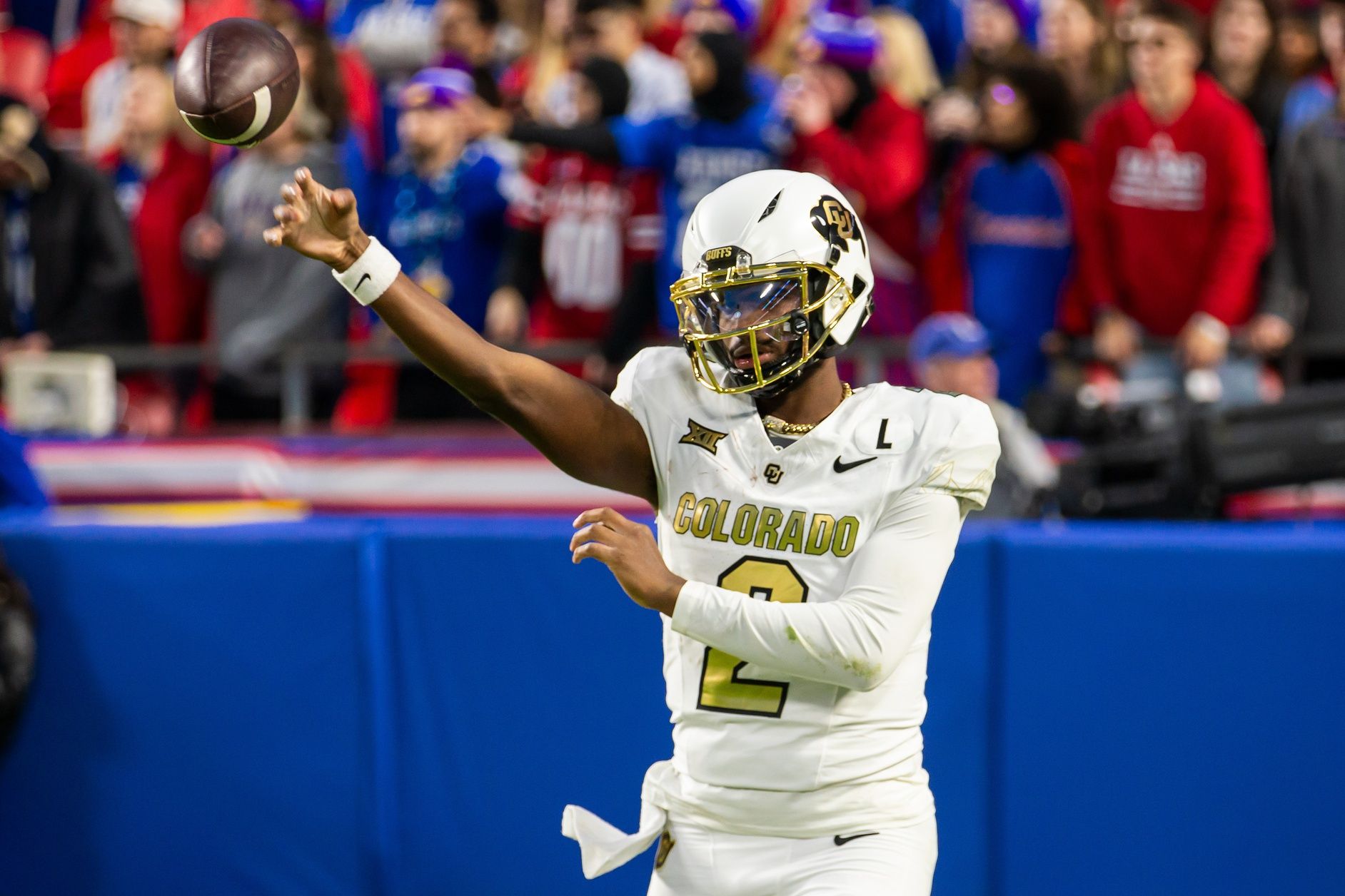 Colorado quarterback Shedeur Sanders (2) warms up during the 4th quarter between the Kansas Jayhawks and the Colorado Buffaloes at GEHA Field at Arrowhead Stadium.