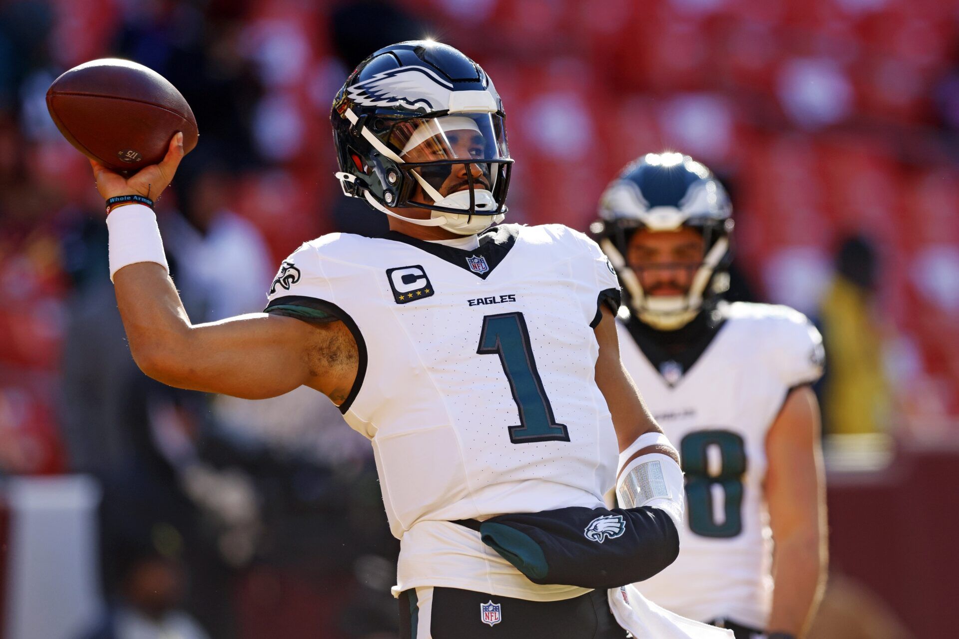 Philadelphia Eagles quarterback Jalen Hurts (1) warms up before the game against the Washington Commanders at Northwest Stadium.