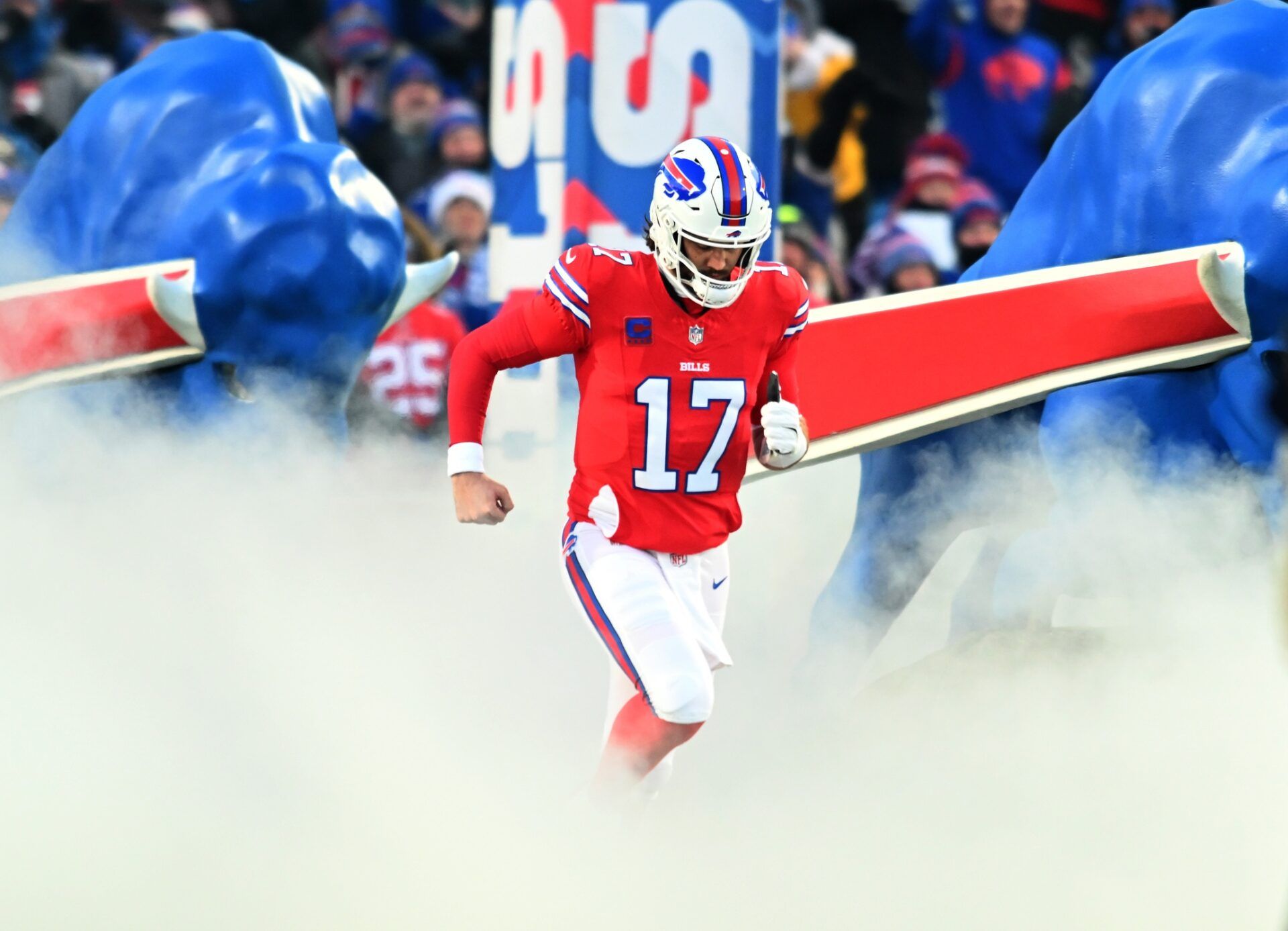 Buffalo Bills quarterback Josh Allen (17) enters the field before a game against the New England Patriots at Highmark Stadium.