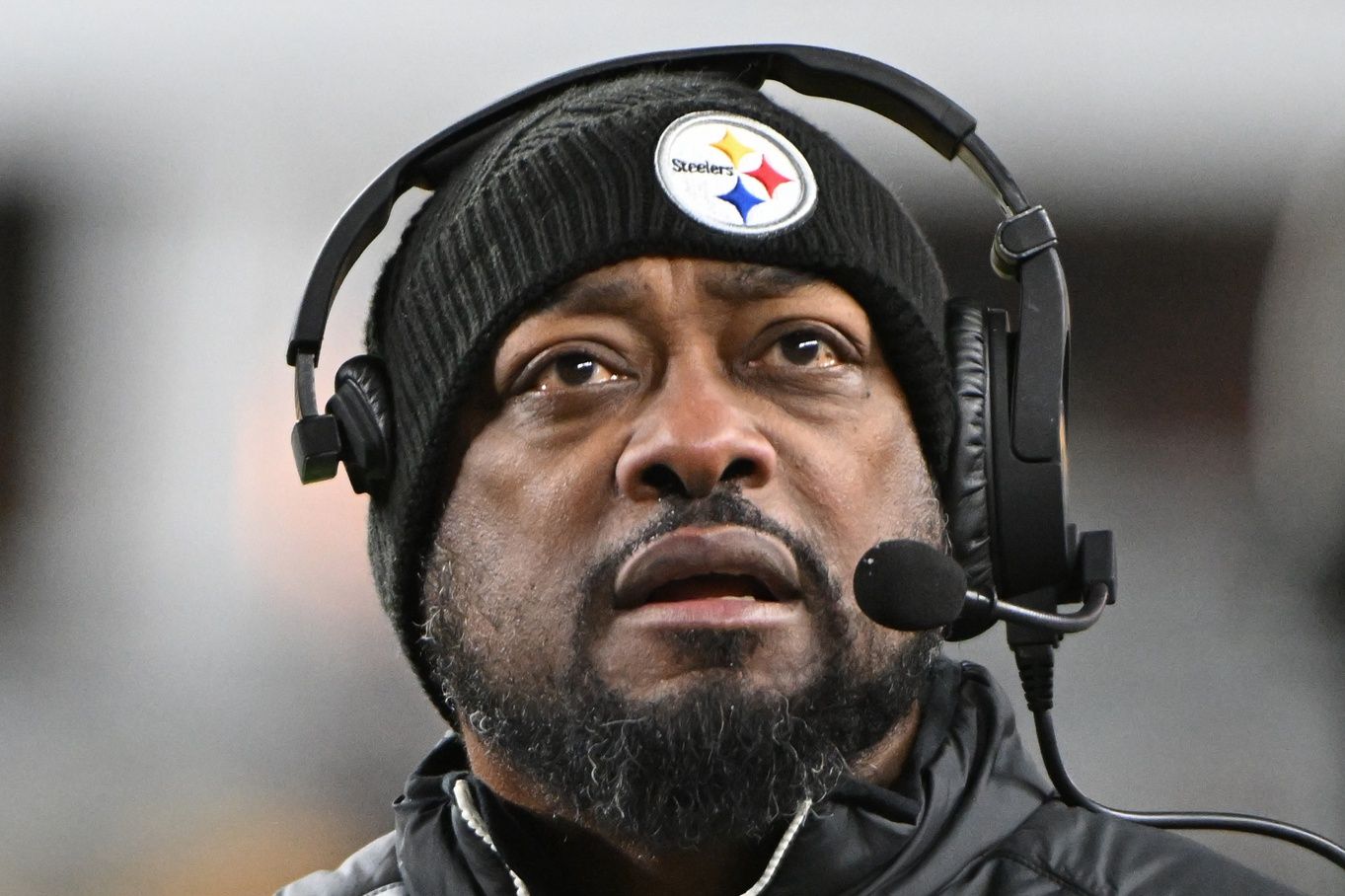 Pittsburgh Steelers head coach Mike Tomlin looks at the scoreboard against the Cincinnati Bengals during the second quarter at Acrisure Stadium.