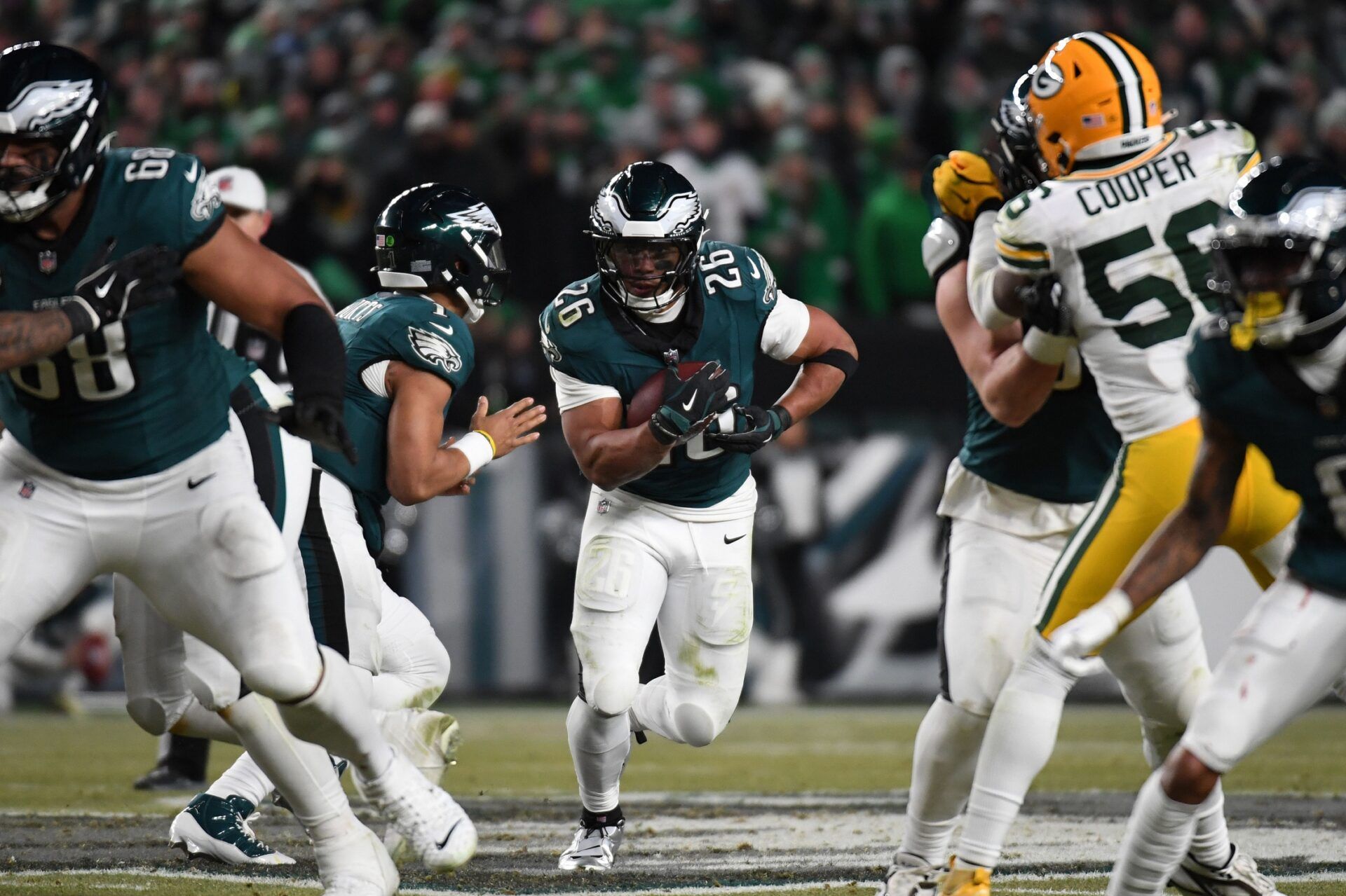 Philadelphia Eagles running back Saquon Barkley (26) rushes the ball against the Green Bay Packers during the second half in an NFC wild card game at Lincoln Financial Field.