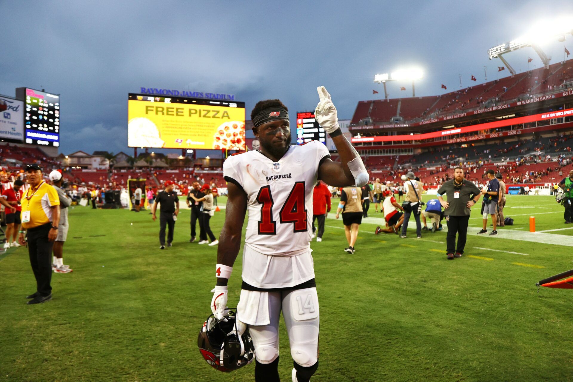 Tampa Bay Buccaneers wide receiver Chris Godwin (14) greets the fans after they beat the Washington Commanders at Raymond James Stadium.