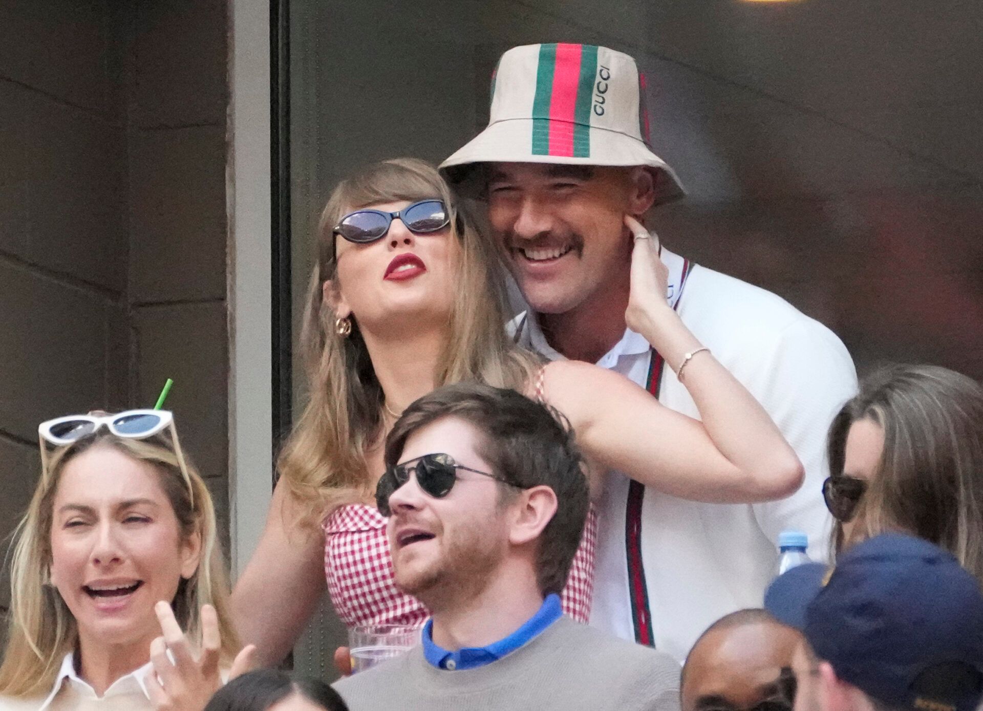 Sep 8, 2024; Flushing, NY, USA; Recording artist Taylor Swift and Kansas City Chiefs tight end Travis Kelce talk during the men’s singles final of the 2024 U.S. Open tennis tournament at USTA Billie Jean King National Tennis Center. Mandatory Credit: Robert Deutsch-Imagn Images