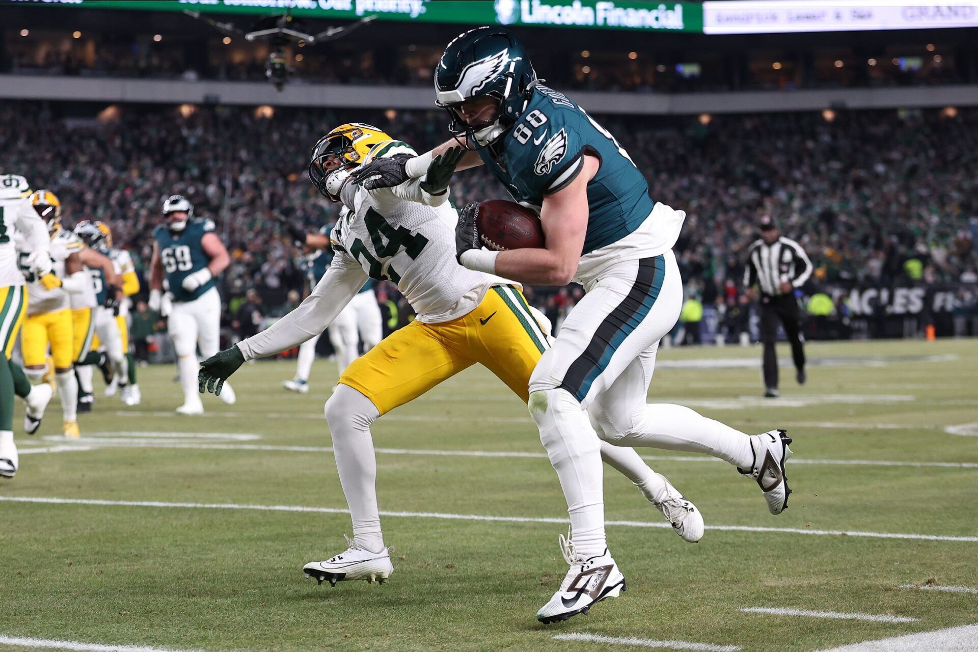 Philadelphia Eagles tight end Dallas Goedert (88) makes a catch against Green Bay Packers cornerback Carrington Valentine (24) during the third quarter in an NFC wild card game at Lincoln Financial Field.