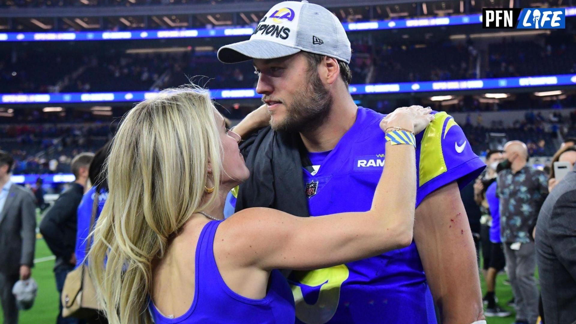 Los Angeles Rams quarterback Matthew Stafford (9) with wife Kelly Hall after defeating the San Francisco 49ers in the NFC Championship Game at SoFi Stadium.