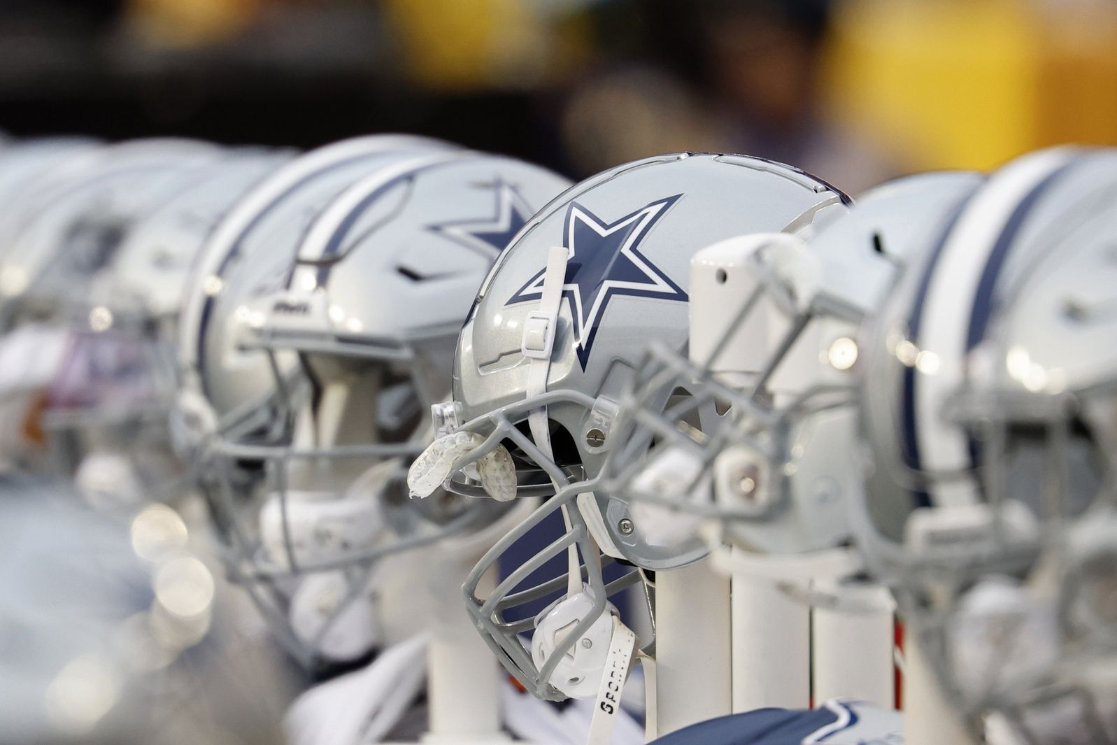 A view of Dallas Cowboys players' helmets on the bench against the Washington Commanders during the first quarter at FedExField.