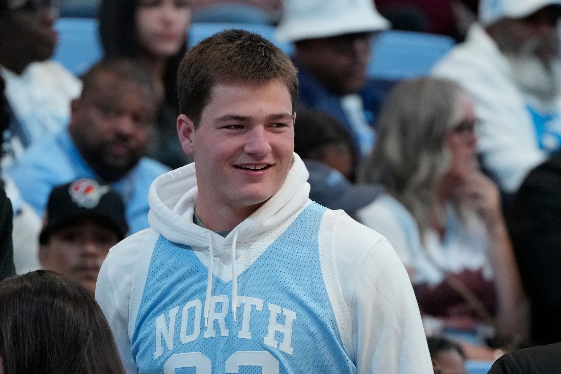 Former North Carolina Tar Heels and current New England Patriots quarterback Drake Maye in attendance before the game at Dean E. Smith Center.