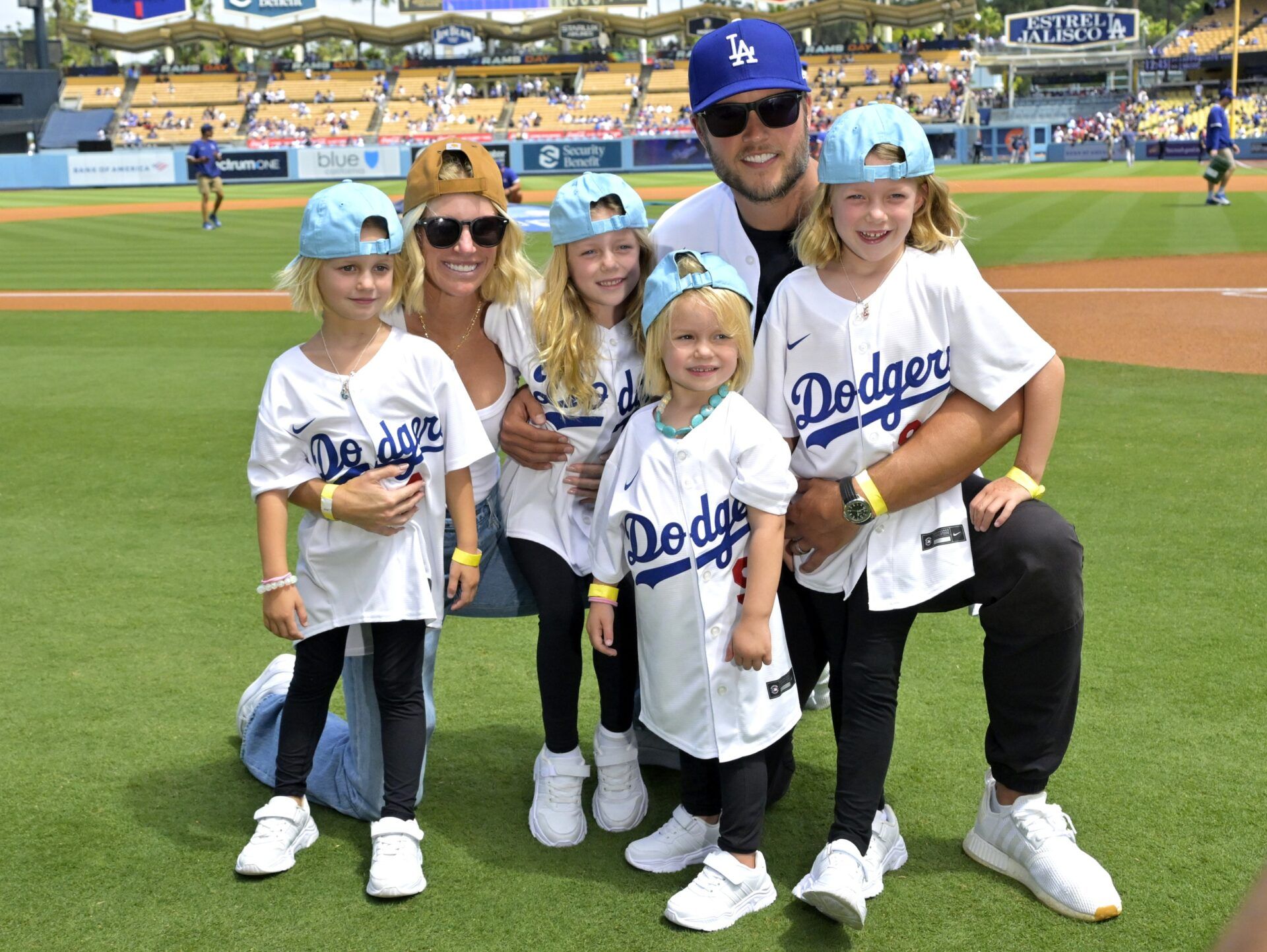 Los Angeles Rams quarterback Matthew Stafford (9) with his wife Kelly with their 4 daughters on the field prior to the game between the Los Angeles Dodgers and the Atlanta Braves at Dodger Stadium. Stafford was at the game on Rams day.