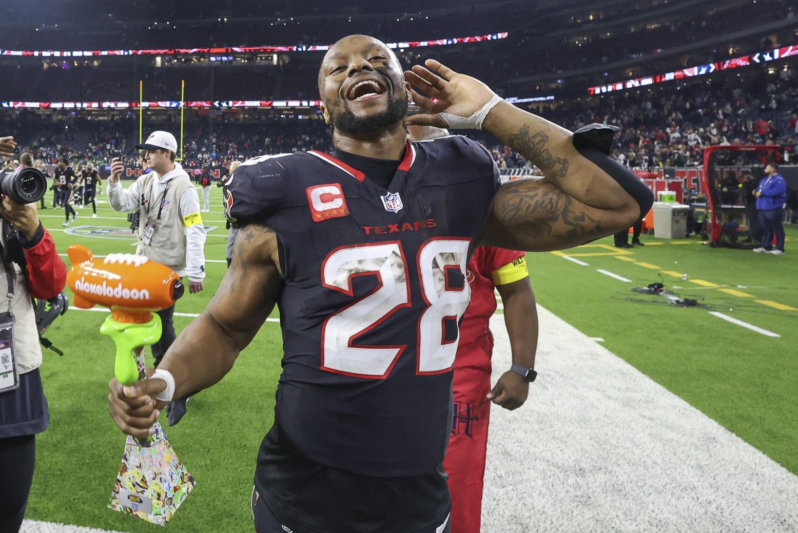 Houston Texans running back Joe Mixon (28) reacts after the game against the Los Angeles Chargers in an AFC wild card game at NRG Stadium.