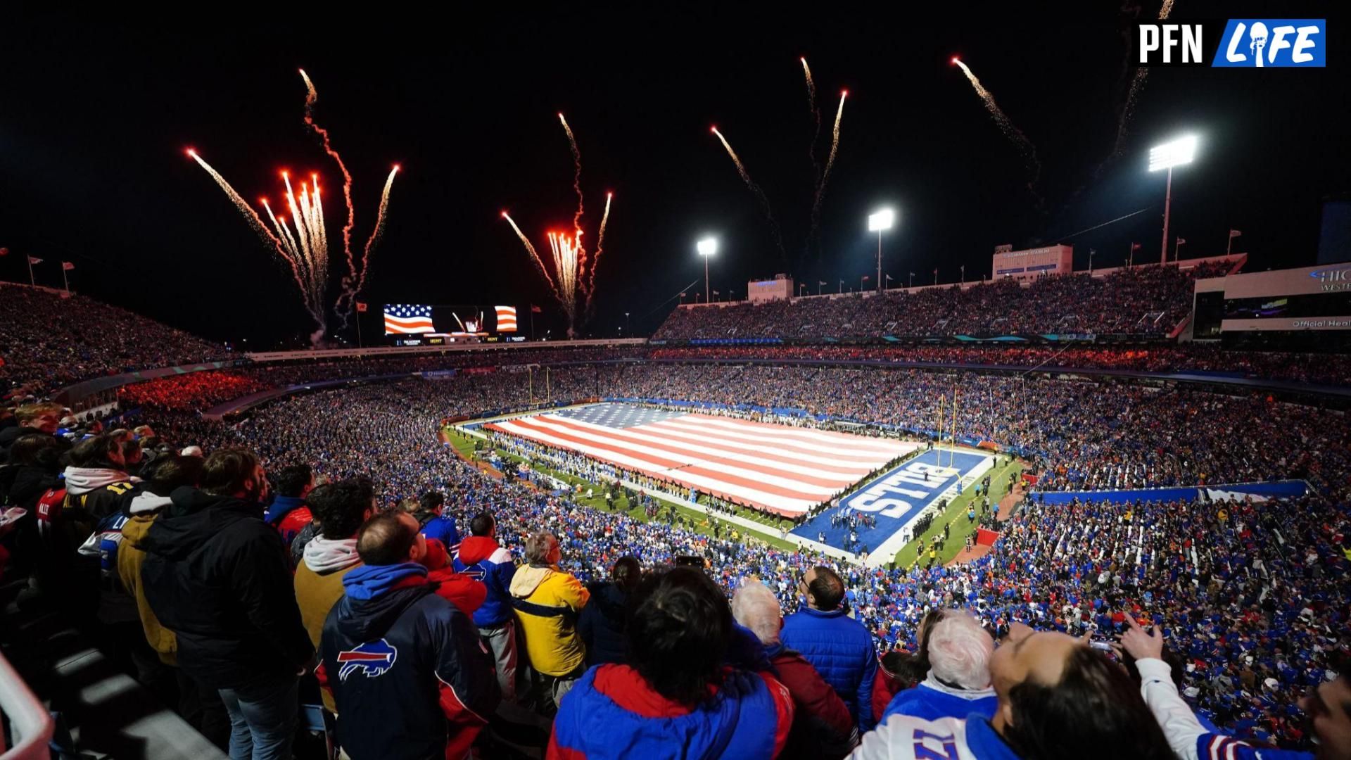 The Buffalo Bills display a field wide flag to show appreciation for Veterans Day during the National Anthem prior to the game against the Denver Broncos at Highmark Stadium.