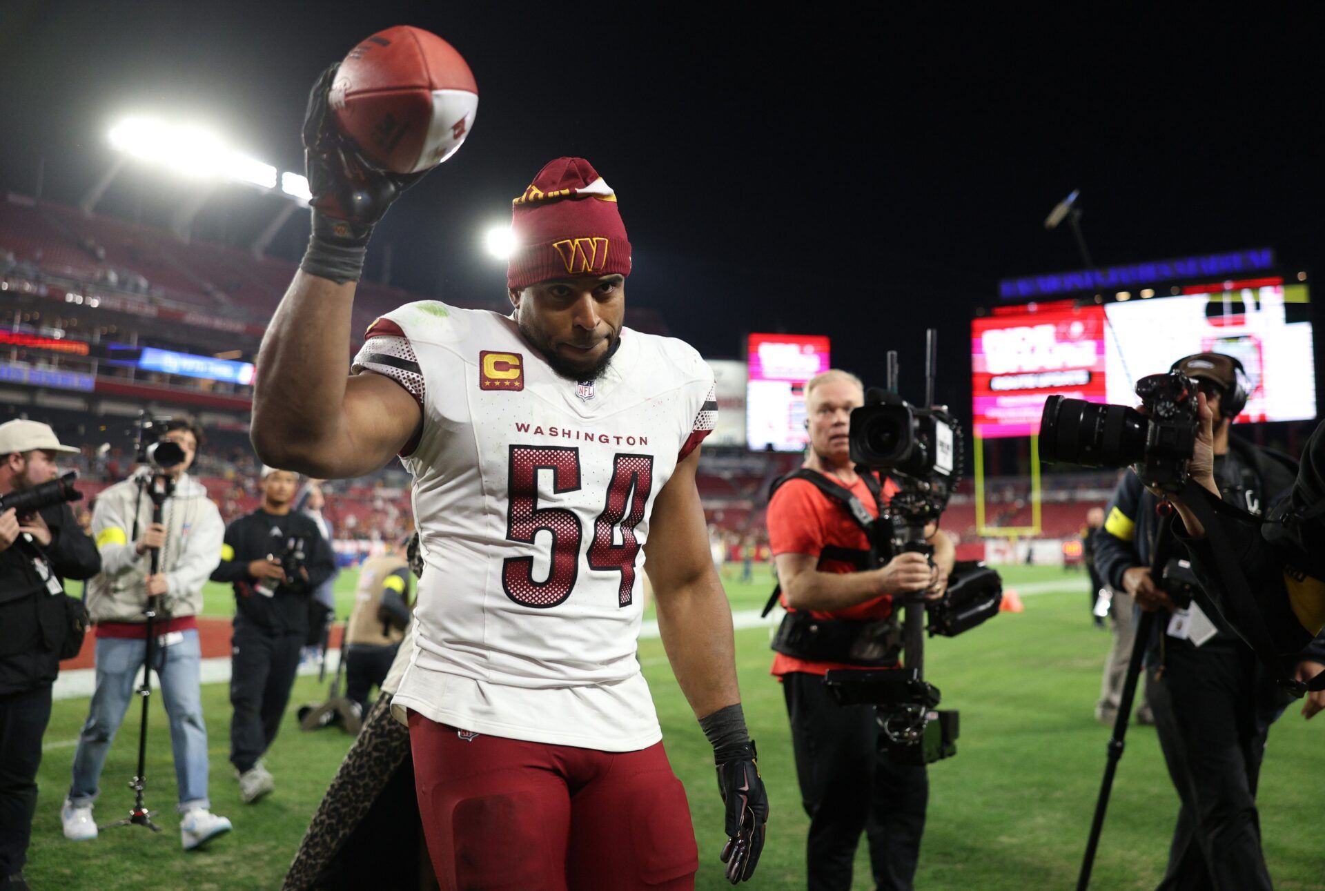 Washington Commanders linebacker Bobby Wagner (54) celebrates after winning a NFC wild card playoff against the Tampa Bay Buccaneers at Raymond James Stadium.