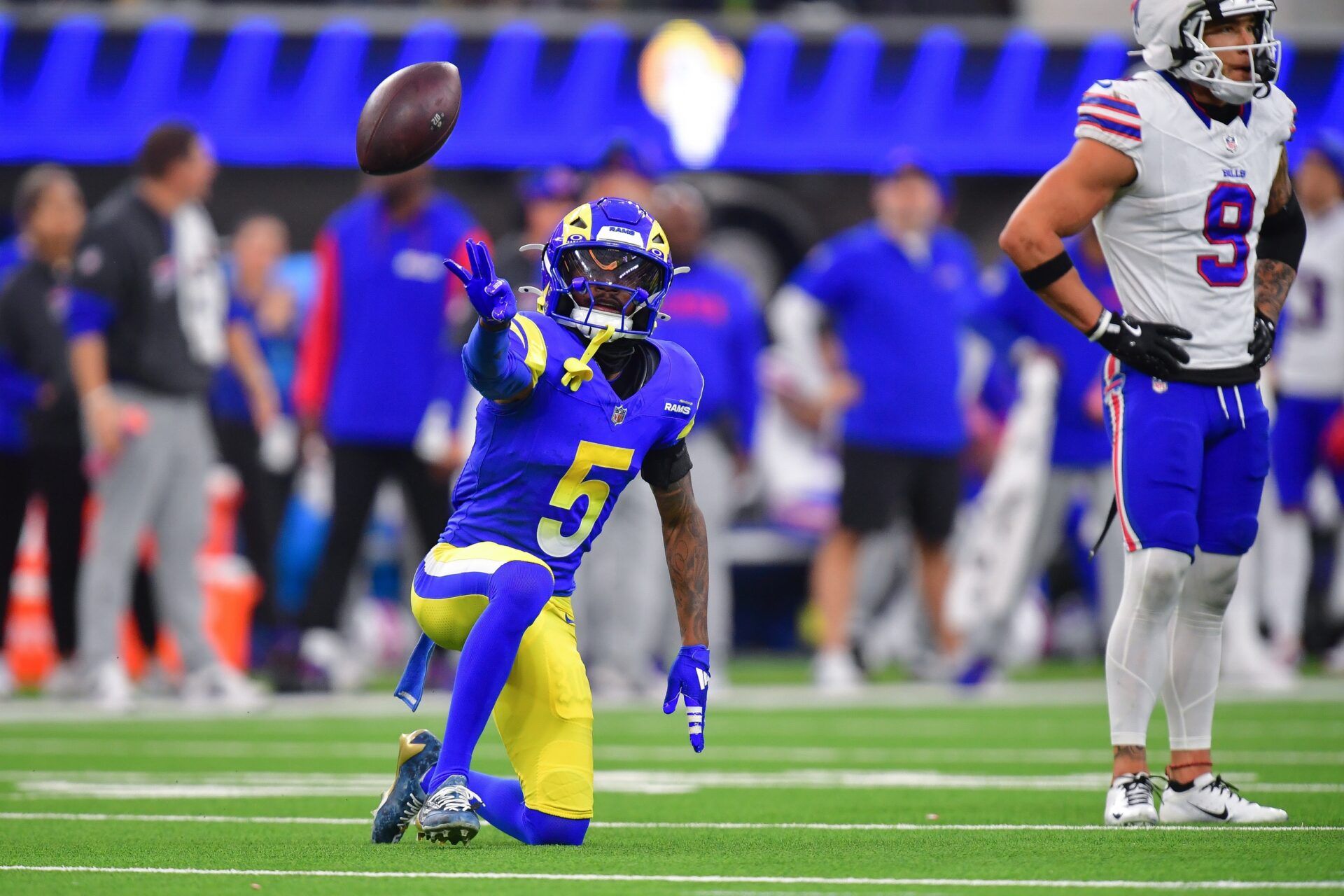 Los Angeles Rams wide receiver Tutu Atwell (5) reacts after catching a pass for first down against the Buffalo Bills during the second half at SoFi Stadium.