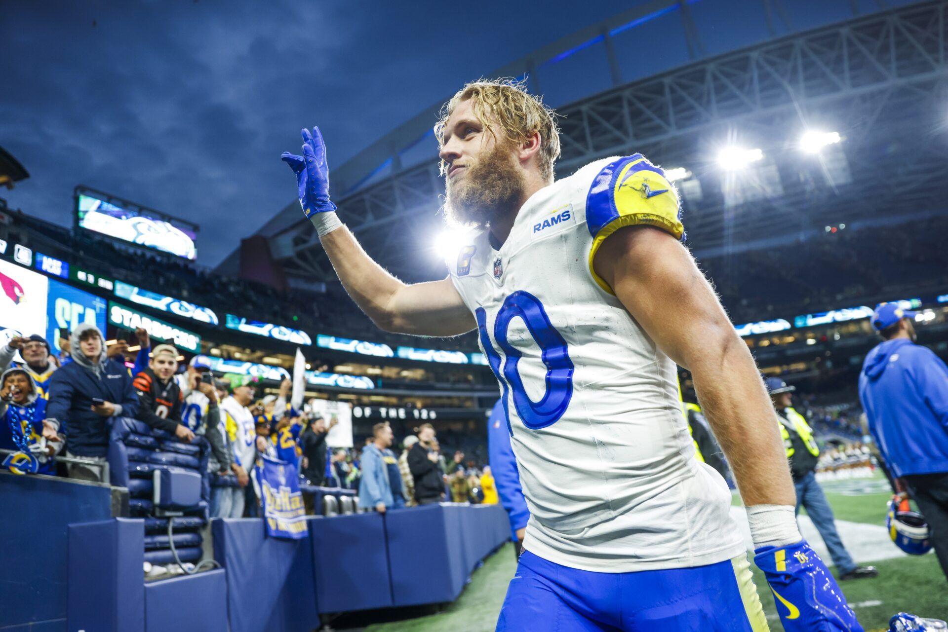 Los Angeles Rams wide receiver Cooper Kupp (10) waves to fans following an overtime victory against the Seattle Seahawks at Lumen Field.