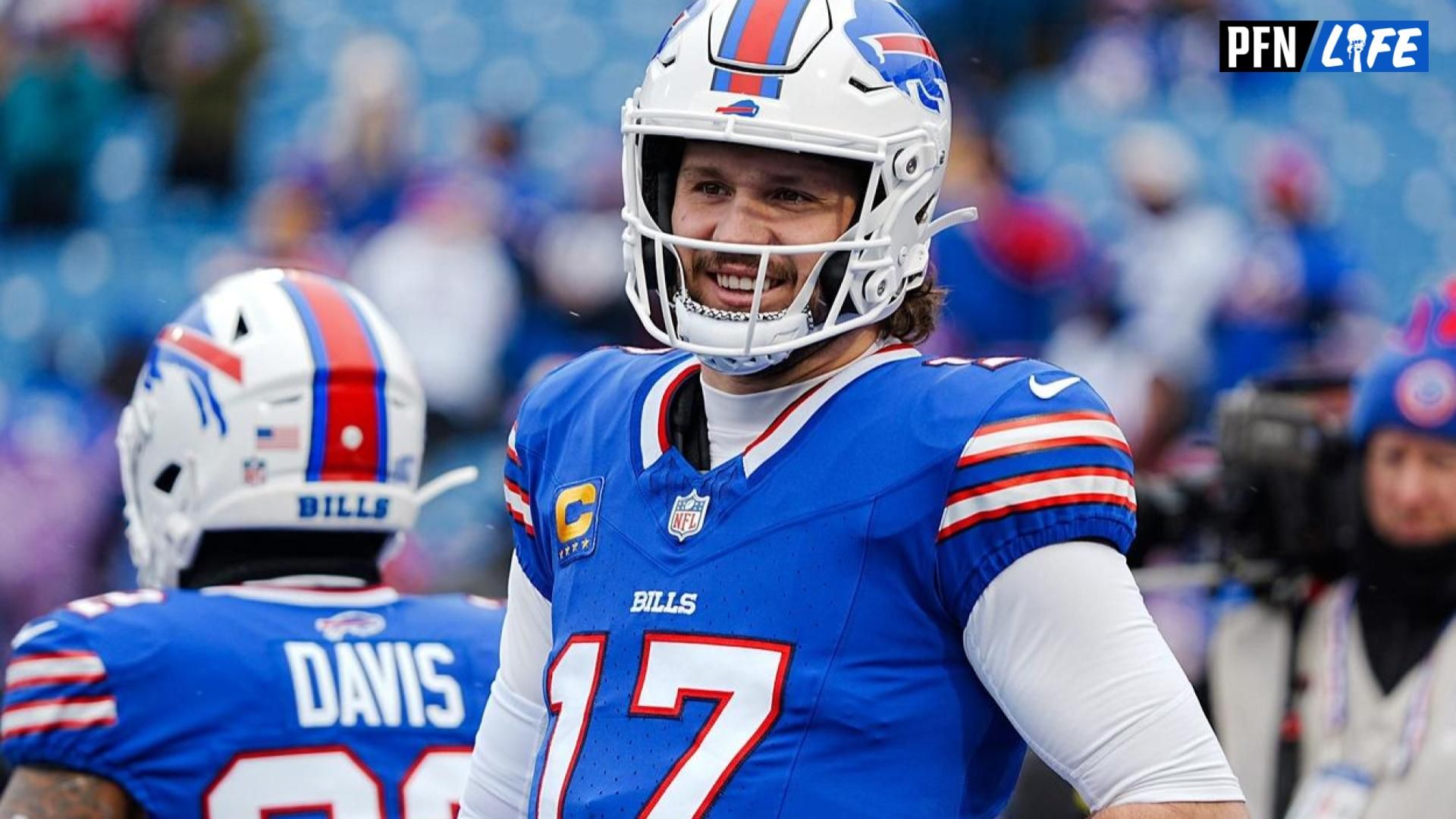 Buffalo Bills quarterback Josh Allen (17) smiles at something someone said before the Buffalo Bills wild card game against the Denver Broncos at Highmark Stadium in Orchard Park on Jan. 12, 2025.