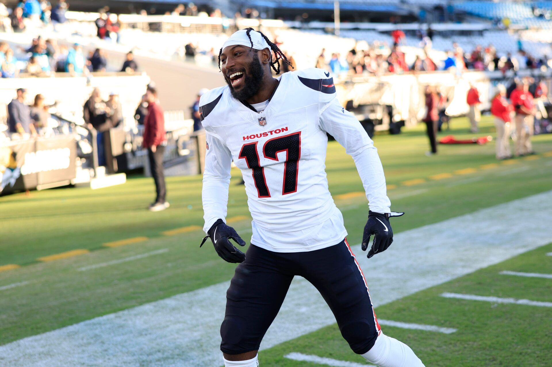 Houston Texans cornerback Kris Boyd (17) cheers after the game of an NFL football matchup Sunday, Dec. 1, 2024 at EverBank Stadium in Jacksonville, Fla. The Texans held off the Jaguars 23-20.