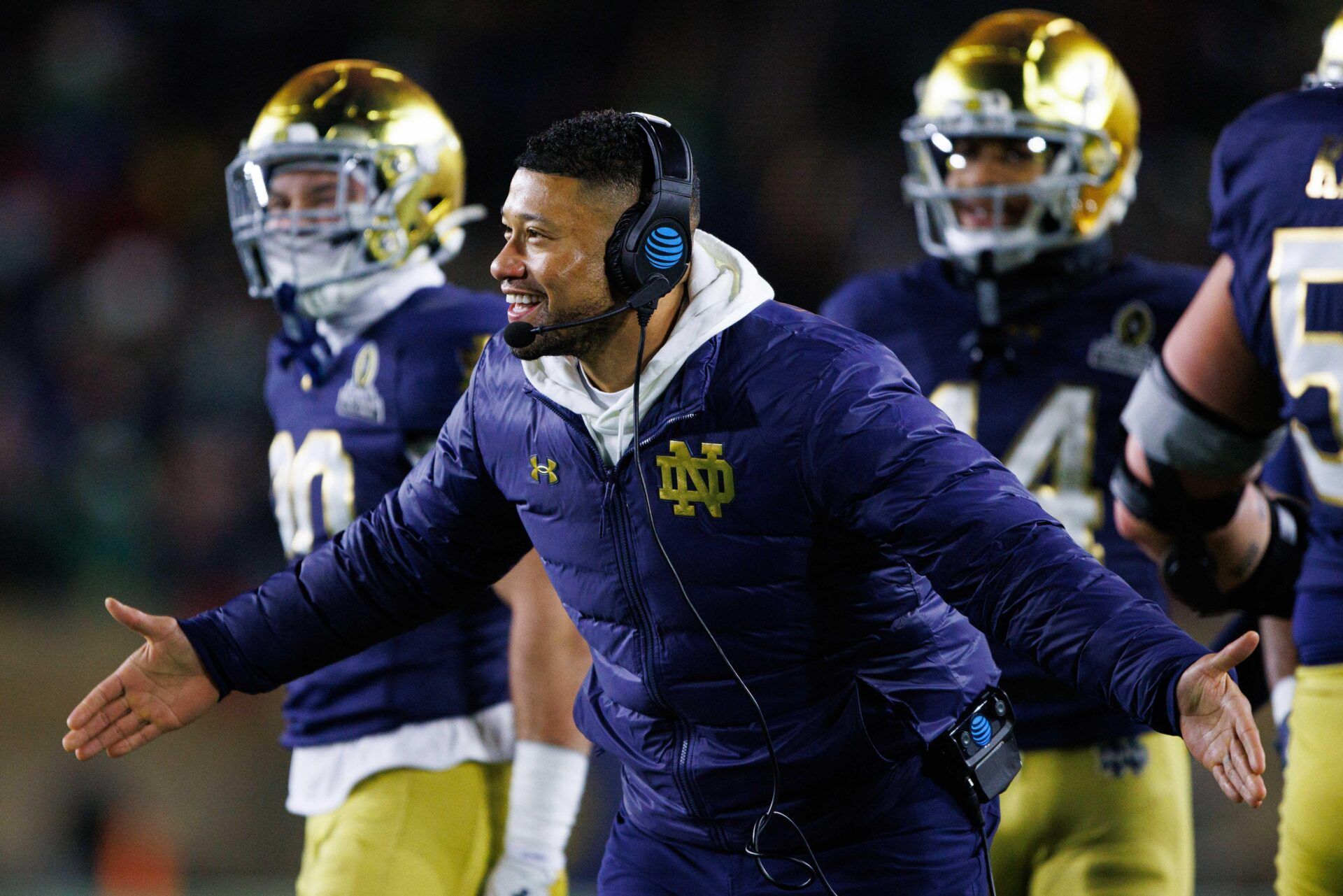 Notre Dame head coach Marcus Freeman celebrates a touchdown scored during the first round of the College Football Playoff between Notre Dame and Indiana University at Notre Dame Stadium on Friday, Dec. 20, 2024, in South Bend.