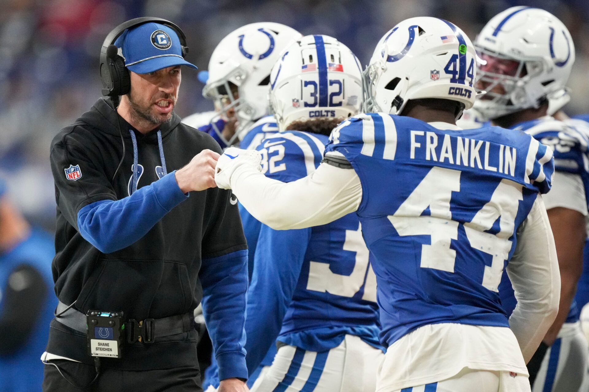 Indianapolis Colts Head Coach Shane Steichen fist bumps Indianapolis Colts linebacker Zaire Franklin (44) on Sunday, Jan. 5, 2025, during a game against the Jacksonville Jaguars at Lucas Oil Stadium in Indianapolis.