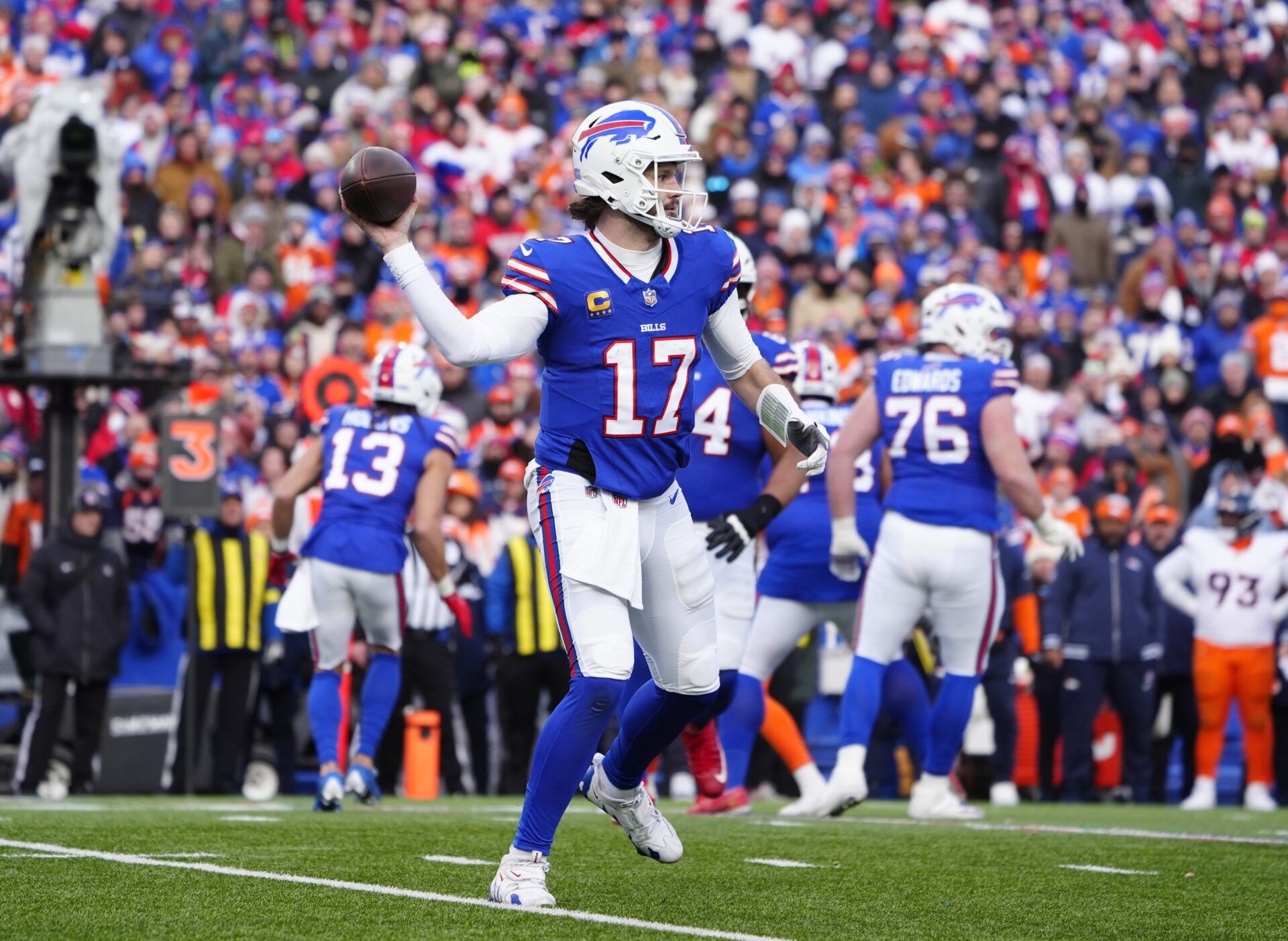 Buffalo Bills quarterback Josh Allen (17) throws downfield during the fourth quarter against the Denver Broncos in an AFC wild card game at Highmark Stadium.