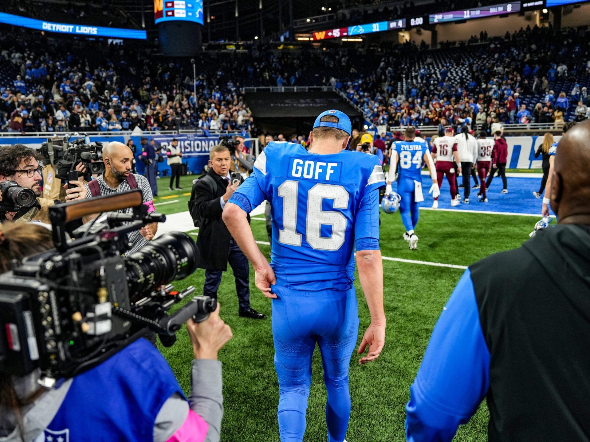 Detroit Lions quarterback Jared Goff walks off the field after losing to the Washington Commanders 45-31 in the NFC divisional round of the NFL playoffs at Ford Field in Detroit, Saturday, Jan. 18, 2025.