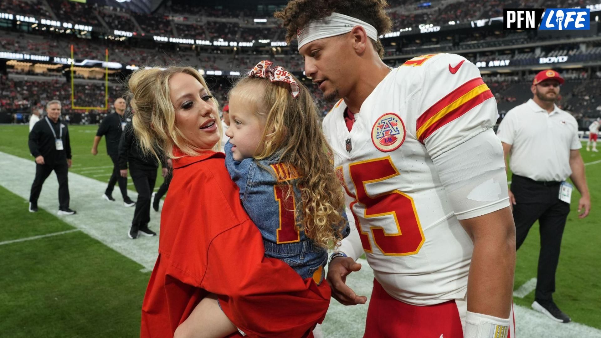 Kansas City Chiefs quarterback Patrick Mahomes (15) interacts with wife Brittany Mahomes and daughter Sterling Mahomes during the game against the Las Vegas Raiders at Allegiant Stadium.