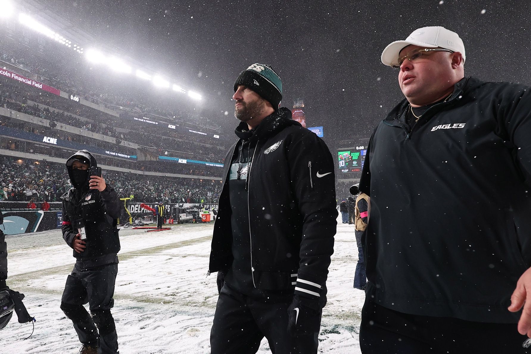 Philadelphia Eagles head coach Nick Sirianni (center) walks off the field after defeating the Los Angeles Rams in a 2025 NFC divisional round game at Lincoln Financial Field.