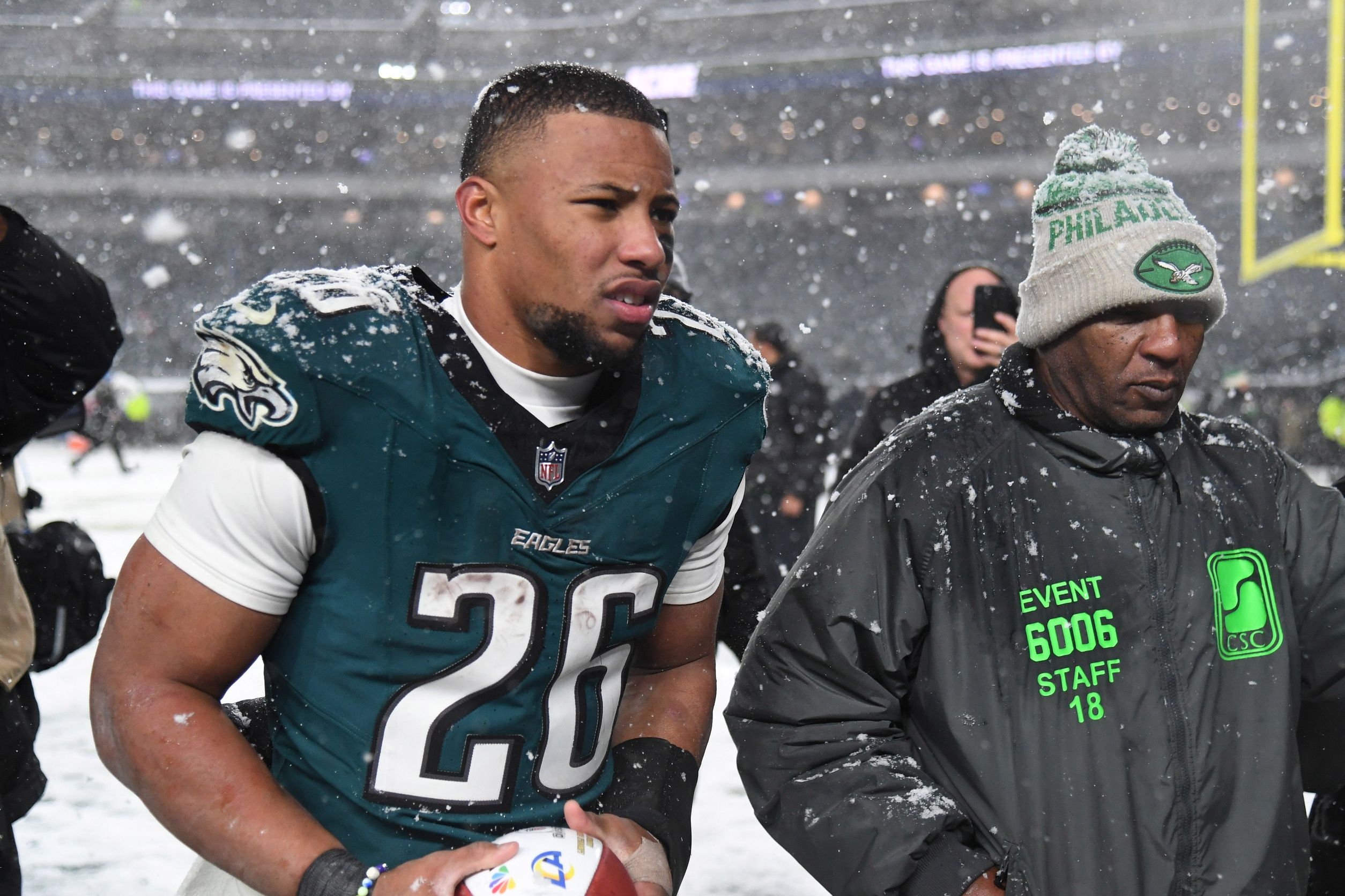 Philadelphia Eagles running back Saquon Barkley (26) walks off the field after defeating the Los Angeles Rams in a 2025 NFC divisional round game at Lincoln Financial Field.