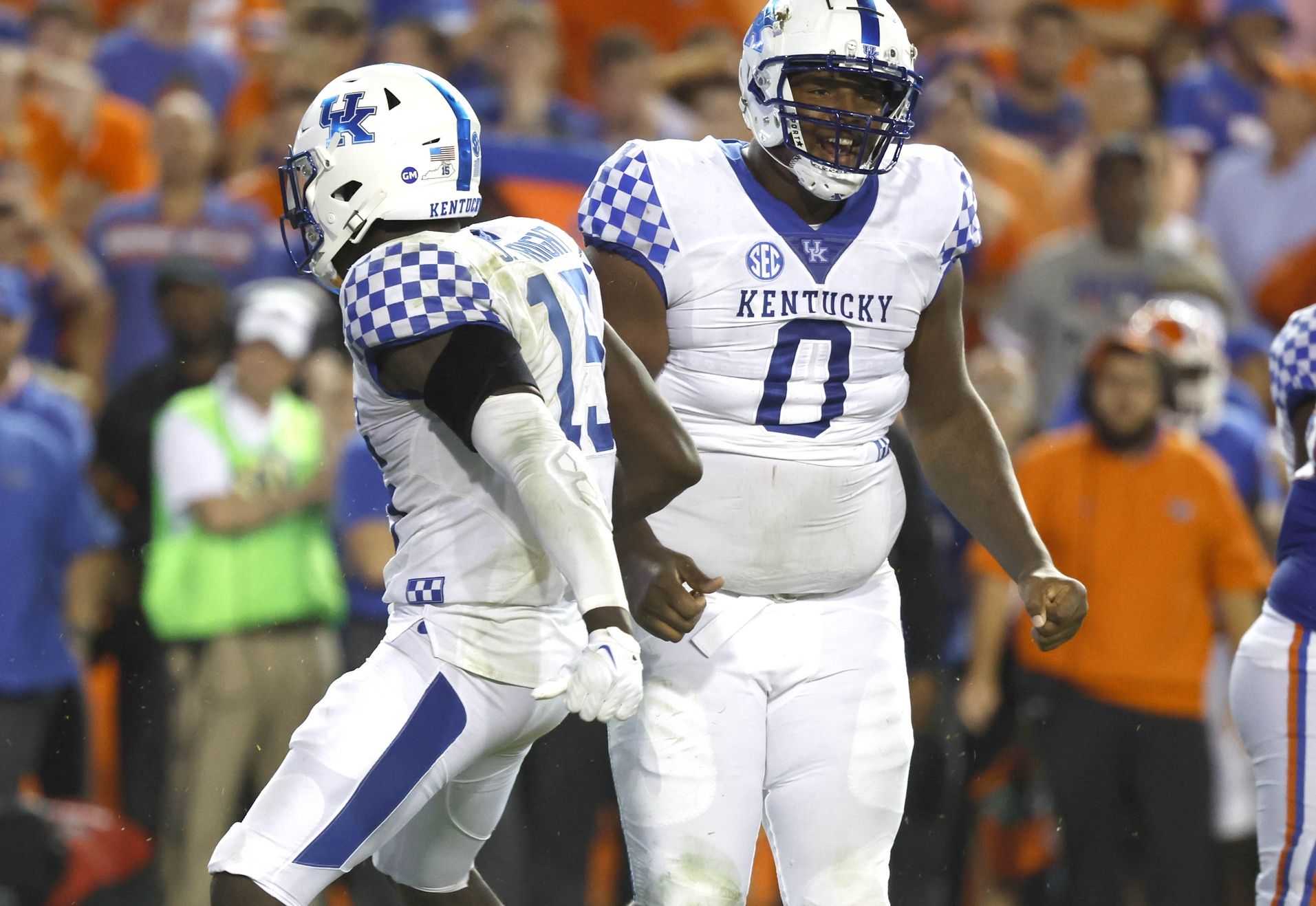 Kentucky Wildcats defensive tackle Deone Walker (0) reacts after making a tackle against the Florida Gators during the second half at Ben Hill Griffin Stadium.